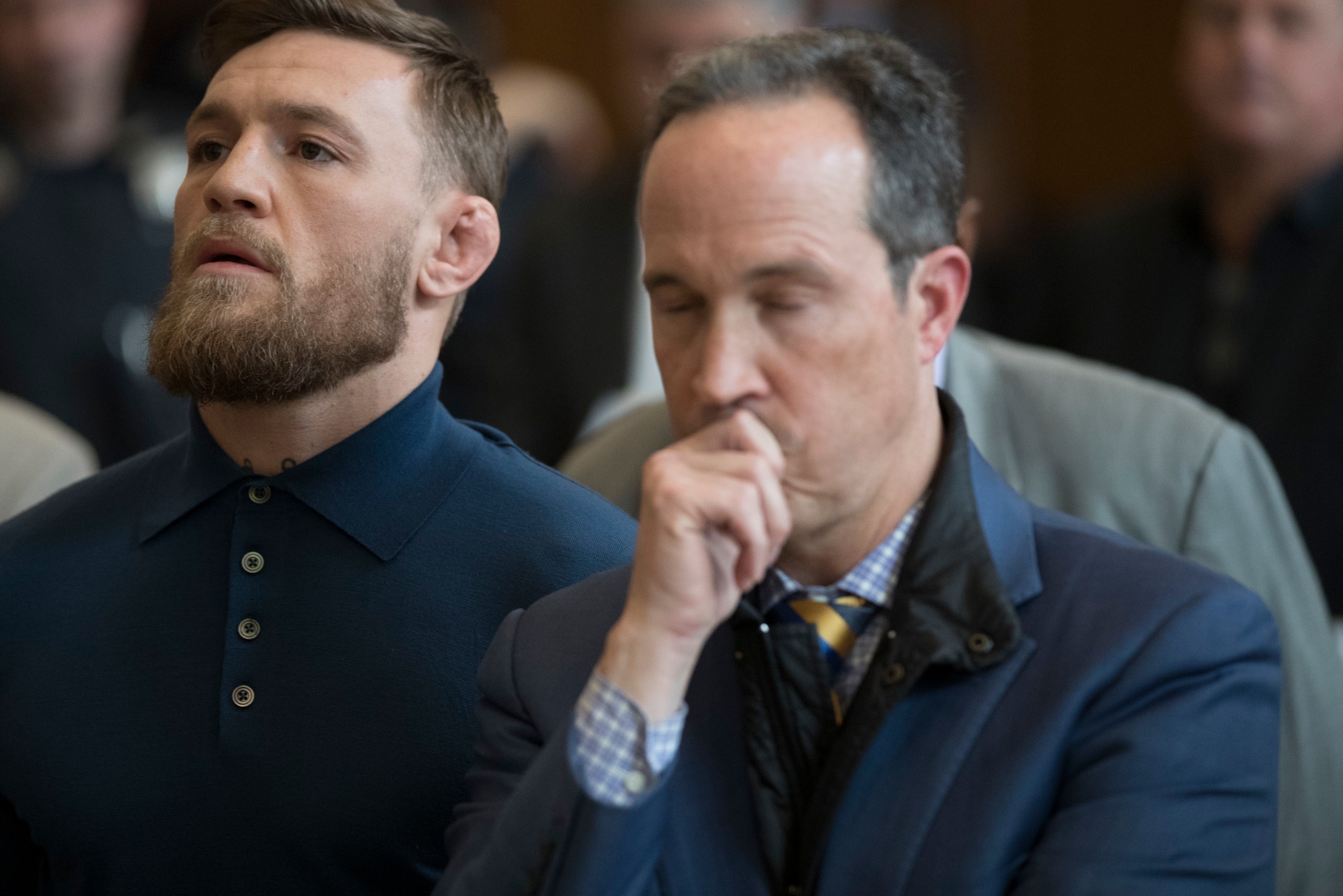 NEW YORK, NY - APRIL 06: Ultimate fighting star Conor McGregor stands with his lawyer Jim Walden during an arraignment in Brooklyn Criminal court on April 6, 2018 in New York City. McGregor is facing criminal charges in the wake of a backstage melee he al