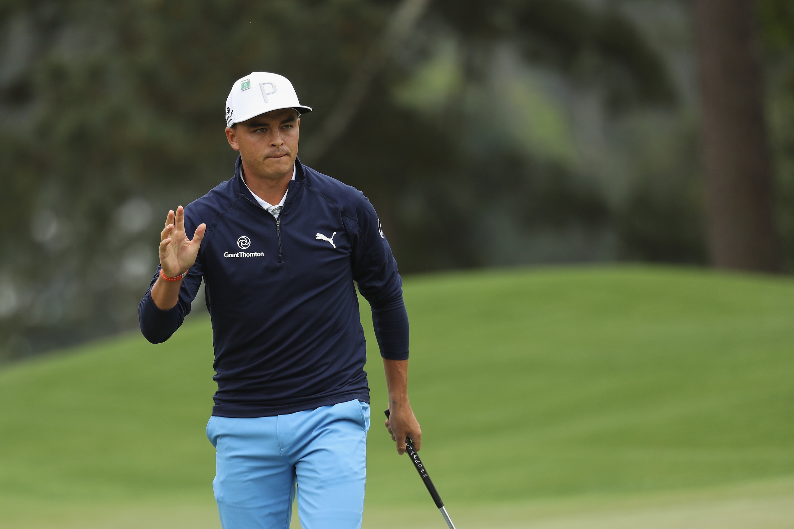 AUGUSTA, GA - APRIL 07:  Rickie Fowler of the United States reacts after a birdie on the eighth green during the third round of the 2018 Masters Tournament at Augusta National Golf Club on April 7, 2018 in Augusta, Georgia.  (Photo by Patrick Smith/Getty 