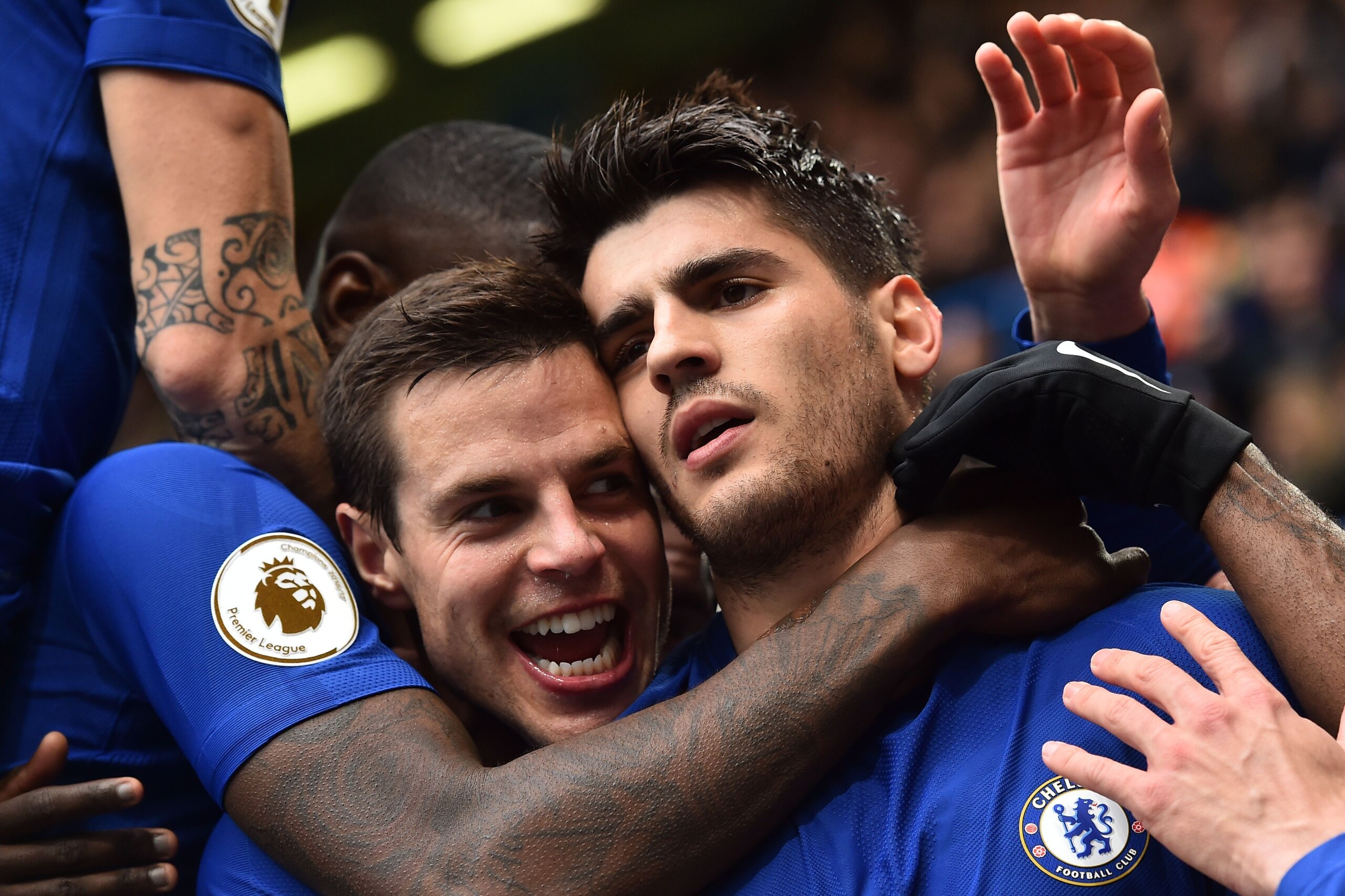 Chelsea's Spanish striker Alvaro Morata (C) celebrates with Chelsea's Spanish defender Cesar Azpilicueta (L) after scoring the opening goal of the English Premier League football match between Chelsea and Tottenham Hotspur at Stamford Bridge in London on Chelsea's Spanish striker Alvaro Morata (C) celebrates with Chelsea's Spanish defender Cesar Azpilicueta (L) after scoring the opening goal of the English Premier League football match between Chelsea and Tottenham Hotspur at Stamford Bridge in London on