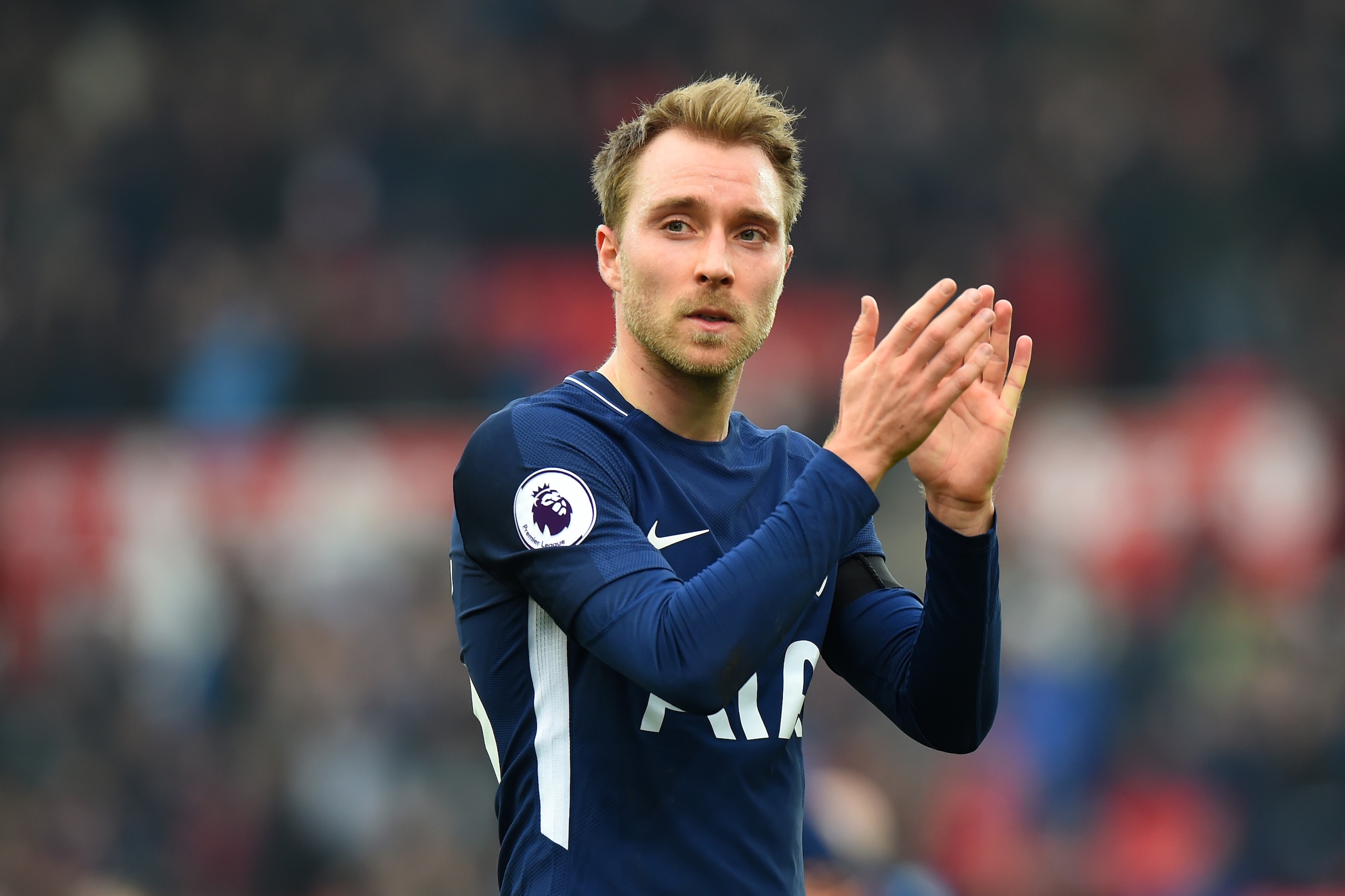 STOKE ON TRENT, ENGLAND - APRIL 07: Christian Eriksen of Tottenham Hotspur shows appreciation to the fans following the Premier League match between Stoke City and Tottenham Hotspur at Bet365 Stadium on April 7, 2018 in Stoke on Trent, England. (Photo b STOKE ON TRENT, ENGLAND - APRIL 07: Christian Eriksen of Tottenham Hotspur shows appreciation to the fans following the Premier League match between Stoke City and Tottenham Hotspur at Bet365 Stadium on April 7, 2018 in Stoke on Trent, England. (Photo b