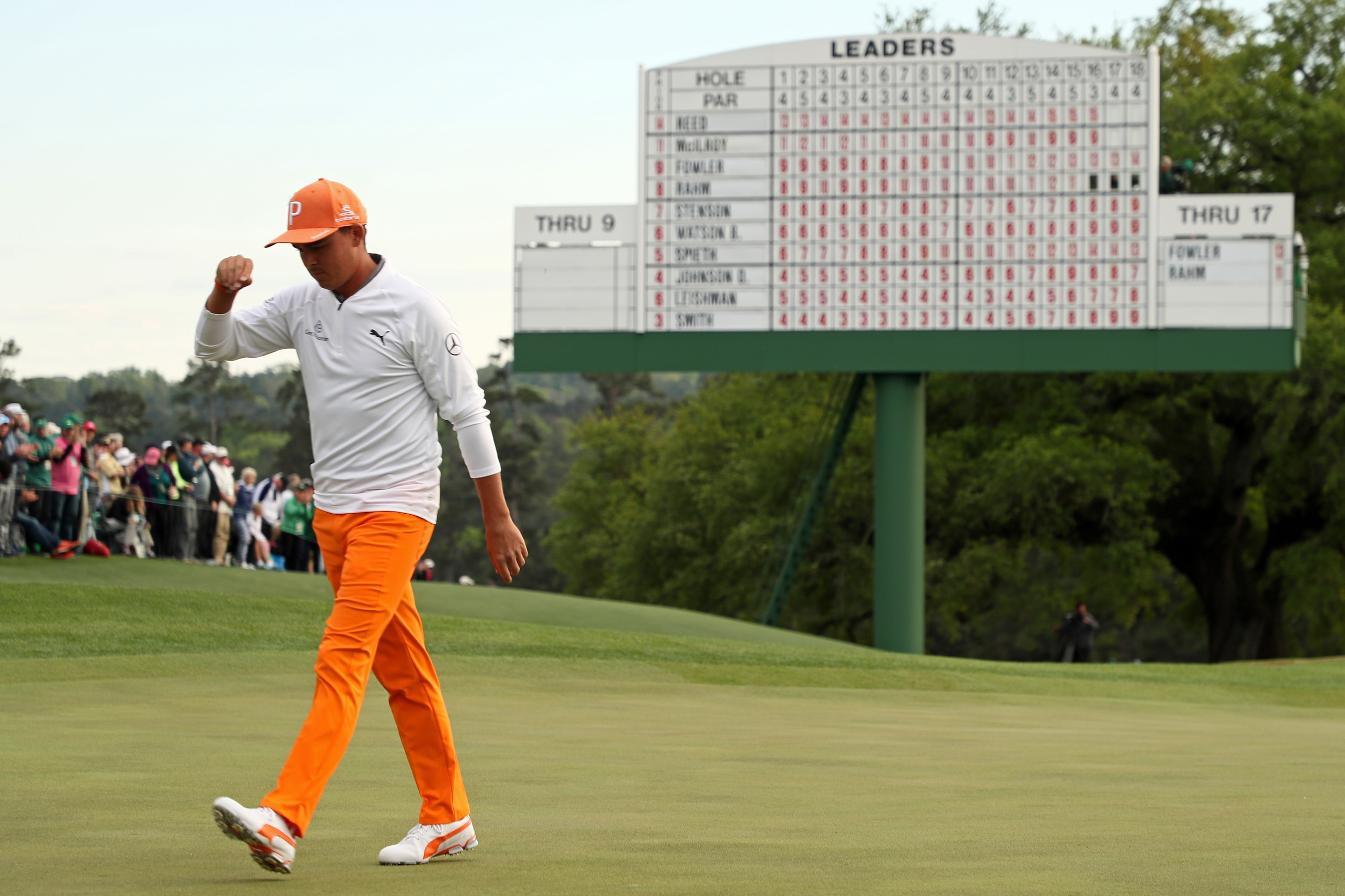 AUGUSTA, GA - APRIL 08: Rickie Fowler of the United States walks off on the 18th green during the final round of the 2018 Masters Tournament at Augusta National Golf Club on April 8, 2018 in Augusta, Georgia.  (Photo by Jamie Squire/Getty Images)