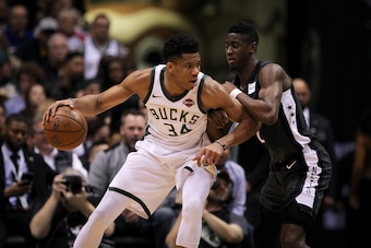 MILWAUKEE, WI - APRIL 05: Giannis Antetokounmpo #34 of the Milwaukee Bucks dribbles the ball while being guarded by Caris LeVert #22 of the Brooklyn Nets in the second quarter at the Bradley Center on April 5, 2018 in Milwaukee, Wisconsin. NOTE TO USER: MILWAUKEE, WI - APRIL 05: Giannis Antetokounmpo #34 of the Milwaukee Bucks dribbles the ball while being guarded by Caris LeVert #22 of the Brooklyn Nets in the second quarter at the Bradley Center on April 5, 2018 in Milwaukee, Wisconsin. NOTE TO USER: