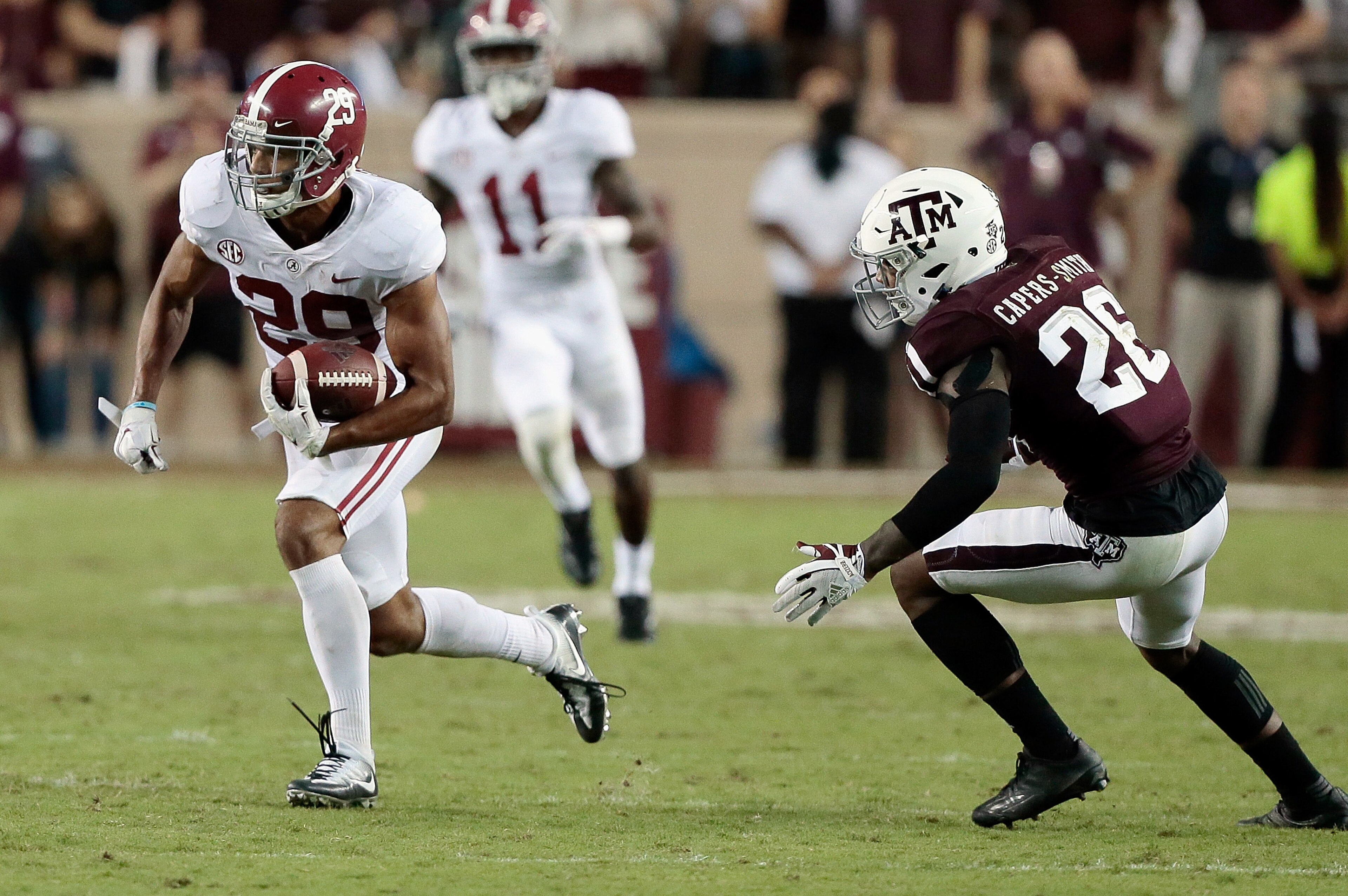 COLLEGE STATION, TX - OCTOBER 07: Minkah Fitzpatrick #29 of the Alabama Crimson Tide returns an onside kick as he runs past Deshawn Capers-Smith #26 of the Texas A&M Aggies at Kyle Field on October 7, 2017 in College Station, Texas. (Photo by Bob Levey/G COLLEGE STATION, TX - OCTOBER 07: Minkah Fitzpatrick #29 of the Alabama Crimson Tide returns an onside kick as he runs past Deshawn Capers-Smith #26 of the Texas A&M Aggies at Kyle Field on October 7, 2017 in College Station, Texas. (Photo by Bob Levey/G