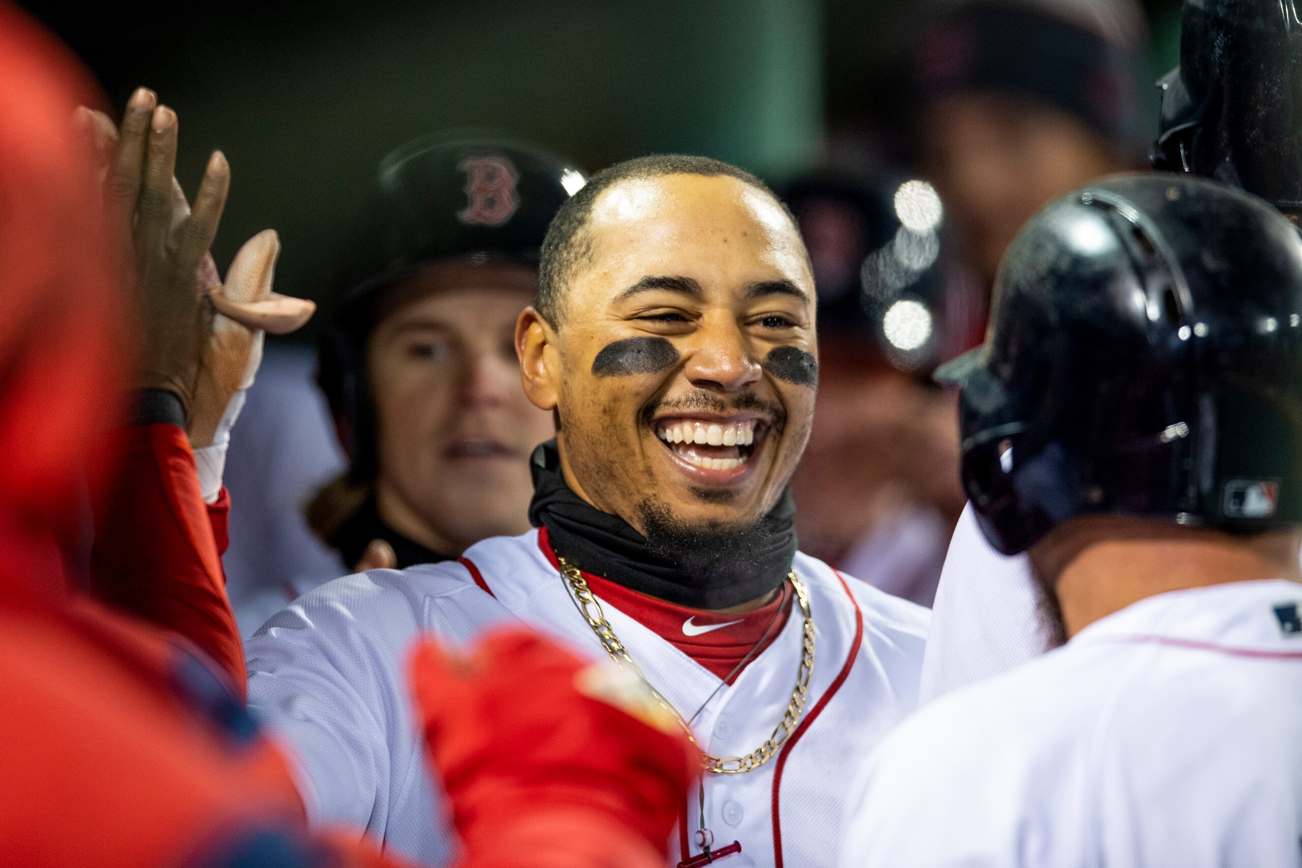 BOSTON, MA - APRIL 10: Mookie Betts #50 of the Boston Red Sox reacts after hitting a grand slam home run during the sixth inning of a game against the New York Yankees on April 10, 2018 at Fenway Park in Boston, Massachusetts. (Photo by Billie Weiss/Bosto