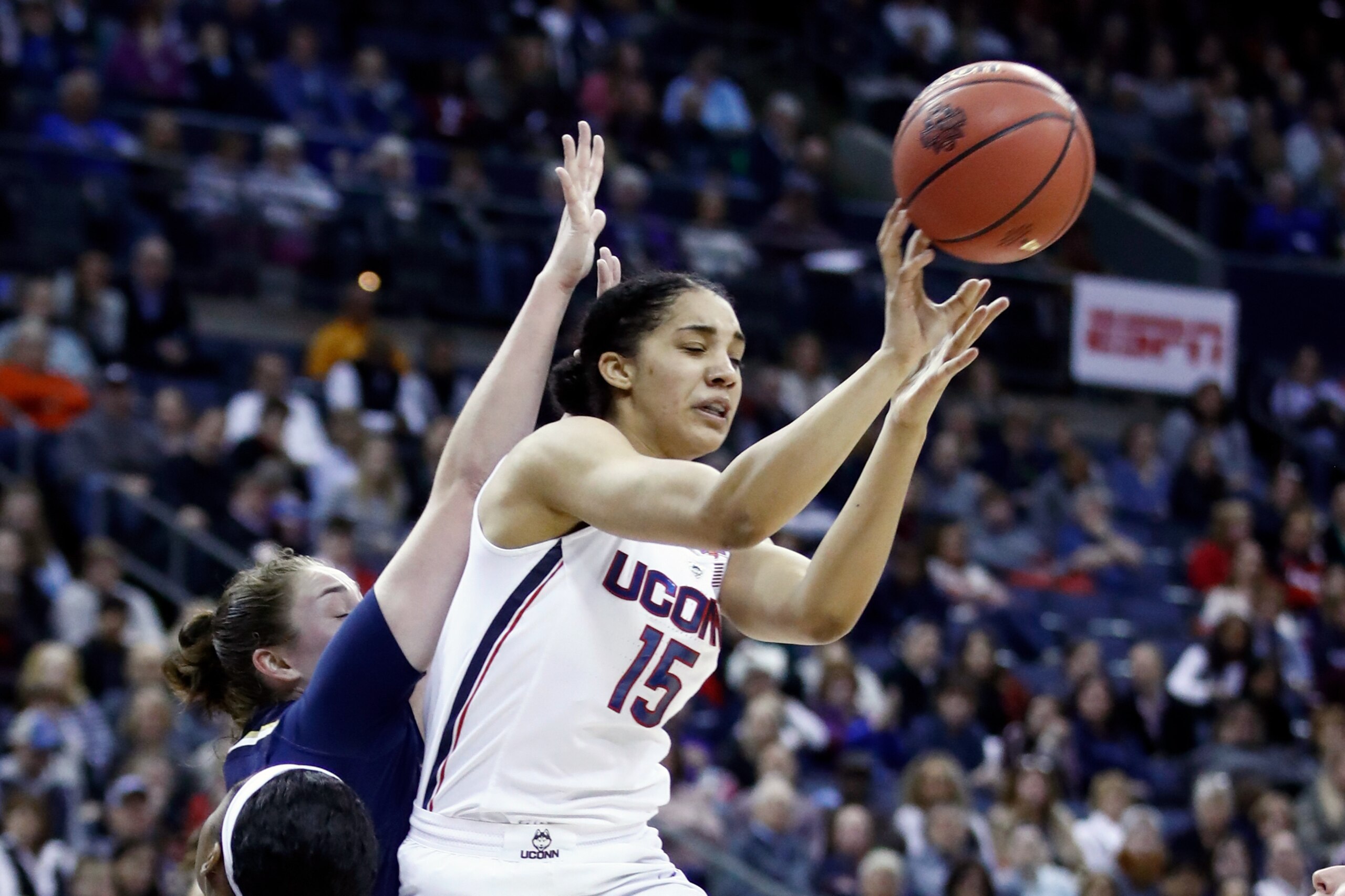 COLUMBUS, OH - MARCH 30: Gabby Williams #15 of the Connecticut Huskies attempts to pass against the Notre Dame Fighting Irish during the second half in the semifinals of the 2018 NCAA Women's Final Four at Nationwide Arena on March 30, 2018 in Columbus, O