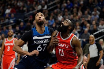 MINNEAPOLIS, MN - MARCH 18: James Harden #13 of the Houston Rockets boxes out Taj Gibson #67 of the Minnesota Timberwolves for a free throw during the game on March 18, 2018 at the Target Center in Minneapolis, Minnesota. NOTE TO USER: User expressly ackn