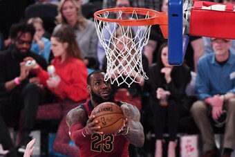 NEW YORK, NY - APRIL 9:  LeBron James #23 of the Cleveland Cavaliers lays up a shot during the game against the New York Knicks at Madison Square Garden on April 9, 2018 in New York City. NOTE TO USER: User expressly acknowledges and agrees that, by downl