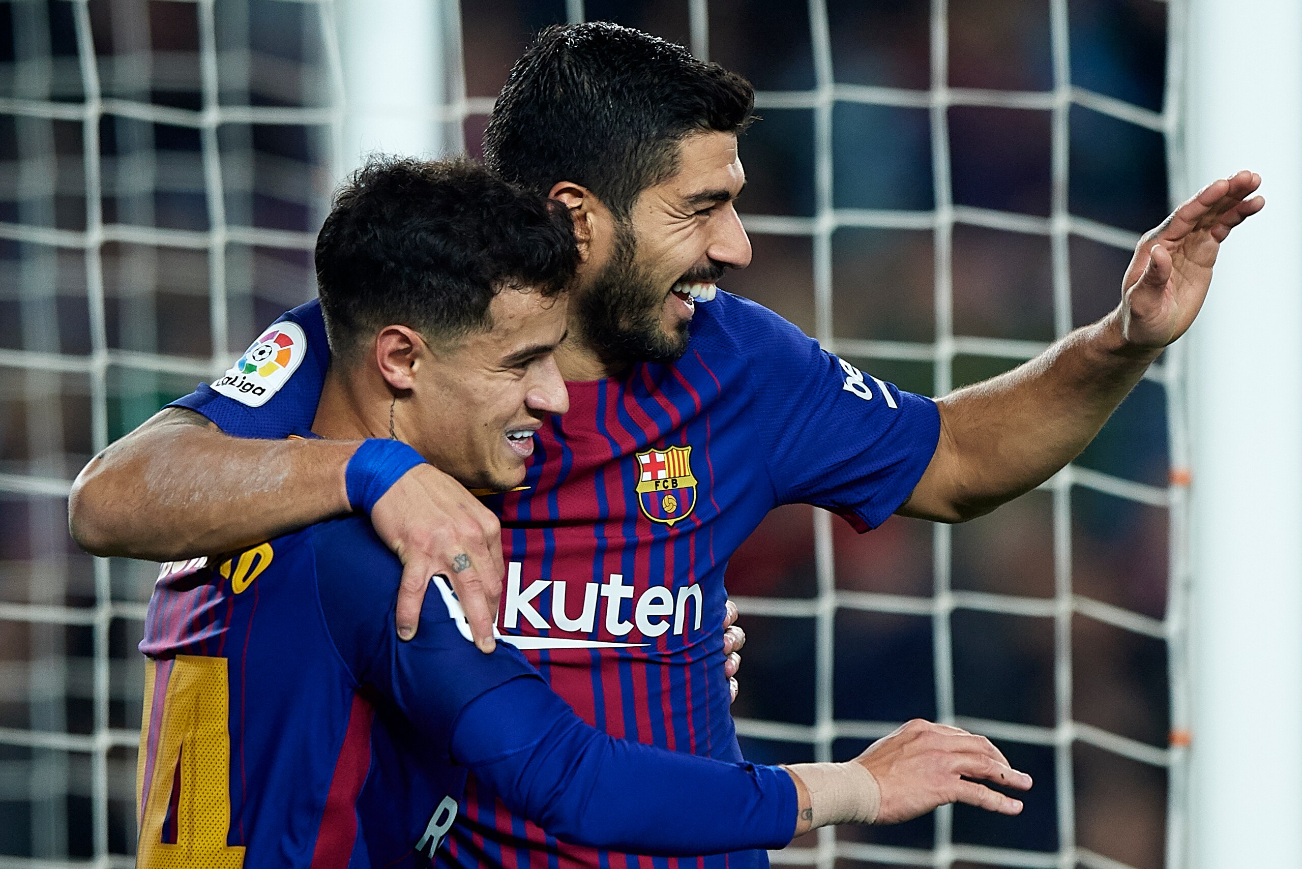 BARCELONA, SPAIN - FEBRUARY 24:  Luis Suarez (R) of Barcelona celebrates after scoring his sides fourth goal with his teammate Philippe Coutinho during the La Liga match between Barcelona and Girona at Camp Nou on February 24, 2018 in Barcelona, Spain.  (