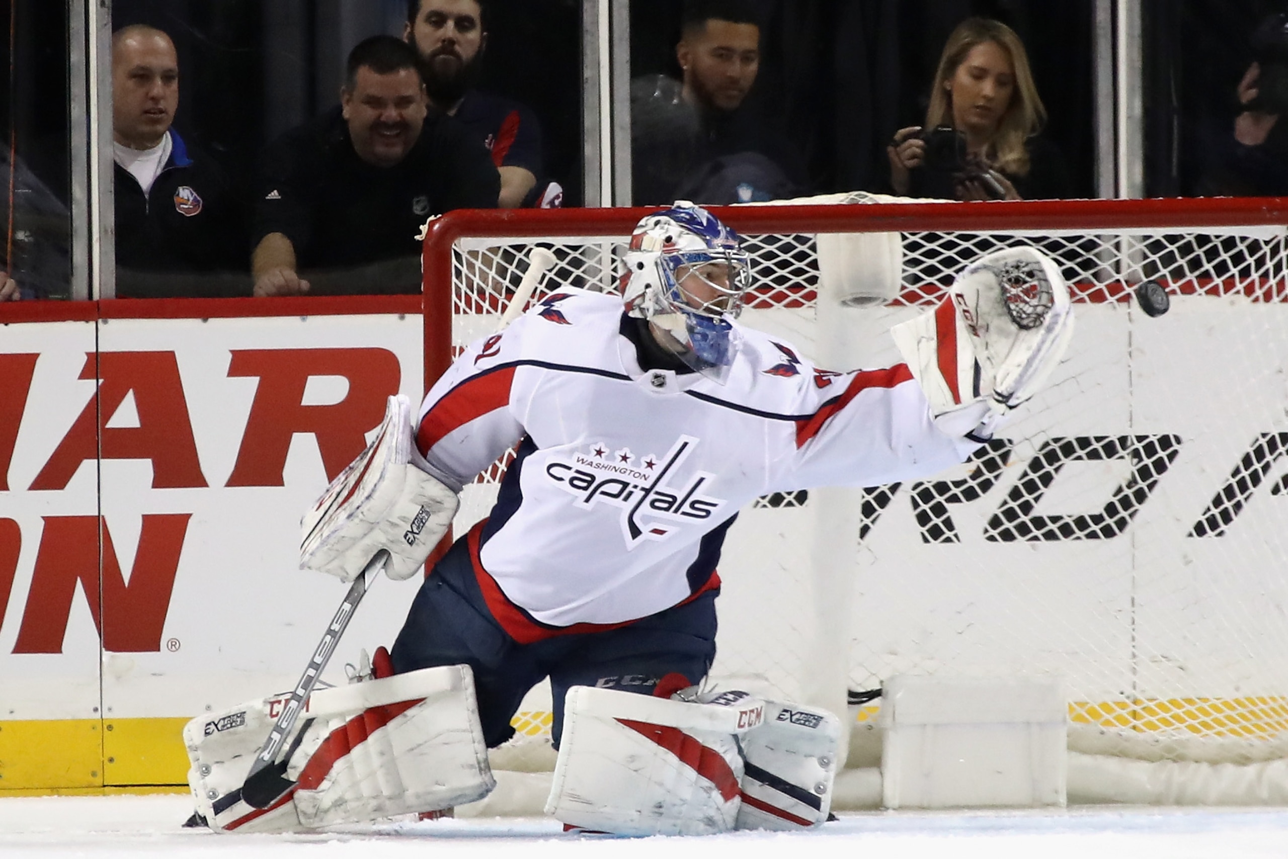 NEW YORK, NY - MARCH 15: Philipp Grubauer #31 of the Washington Capitals makes the first period save against the New York Islanders at the Barclays Center on March 15, 2018 in the Brooklyn borough of New York City.  (Photo by Bruce Bennett/Getty Images)