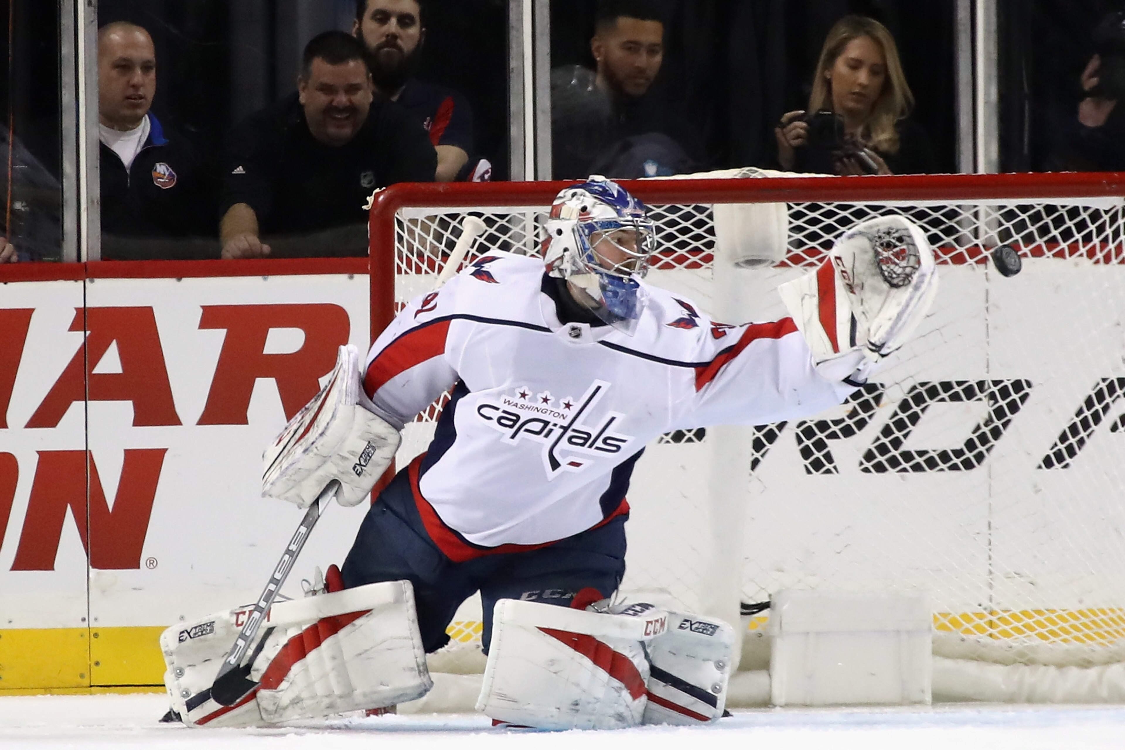 NEW YORK, NY - MARCH 15: Philipp Grubauer #31 of the Washington Capitals makes the first period save against the New York Islanders at the Barclays Center on March 15, 2018 in the Brooklyn borough of New York City.  (Photo by Bruce Bennett/Getty Images)