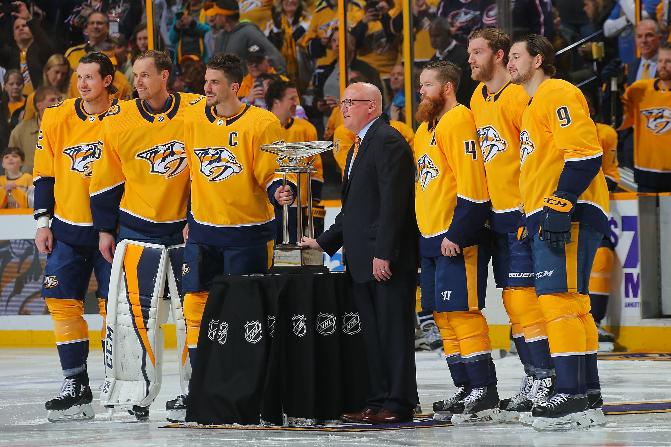 NASHVILLE, TN - APRIL 07:  NHL Assistant Commissioner Bill Daly presents the President's Trophy to the Nashville Predators prior to their final regular season game against the Columbus Blue Jackets at Bridgestone Arena on April 7, 2018 in Nashville, Tenne