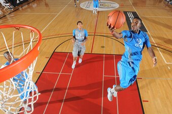 LONG BEACH, CA - AUGUST 6: Jordan Bell of the Blue Team with the finger roll at the rim during the adidas Nations on August 6, 2012 at Long Beach City College in Long Beach, California. (Photo by Kelly Kline/Getty Images)