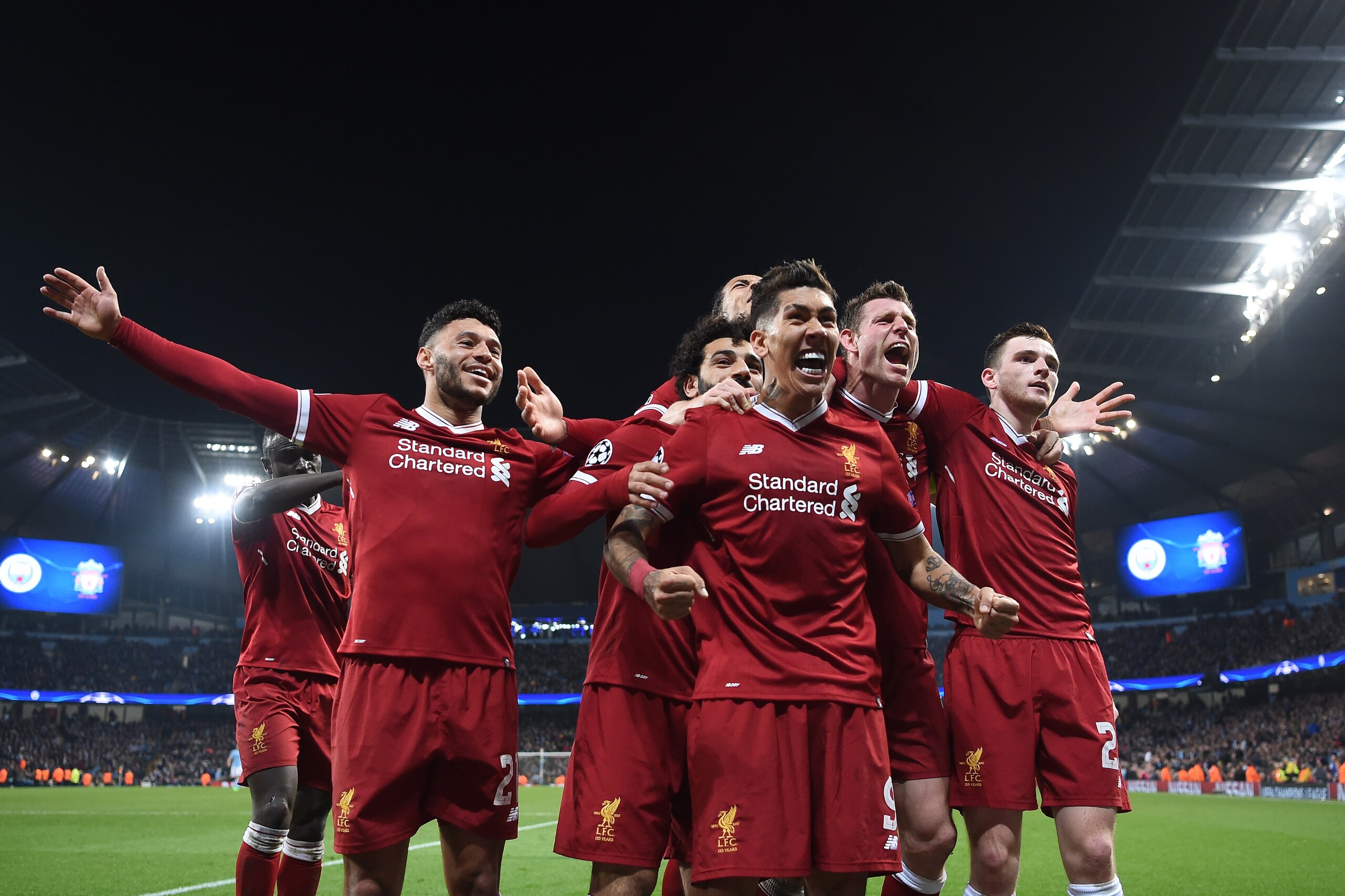 MANCHESTER, ENGLAND - APRIL 10:  Roberto Firmino of Liverpool celebrates scoring the second goal with Alex Oxlade-Chamberlain, Virgil Van Dijk, James Milner and Andy Roberton during the Quarter Final Second Leg match between Manchester City and Liverpool 