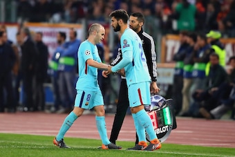 ROME, ITALY - APRIL 10: Andres Iniesta of FC Barcelona is replaced as a substitute by teammate Andre Gomes during the UEFA Champions League Quarter Final, second leg match between AS Roma and FC Barcelona at Stadio Olimpico on April 10, 2018 in Rome, Ital