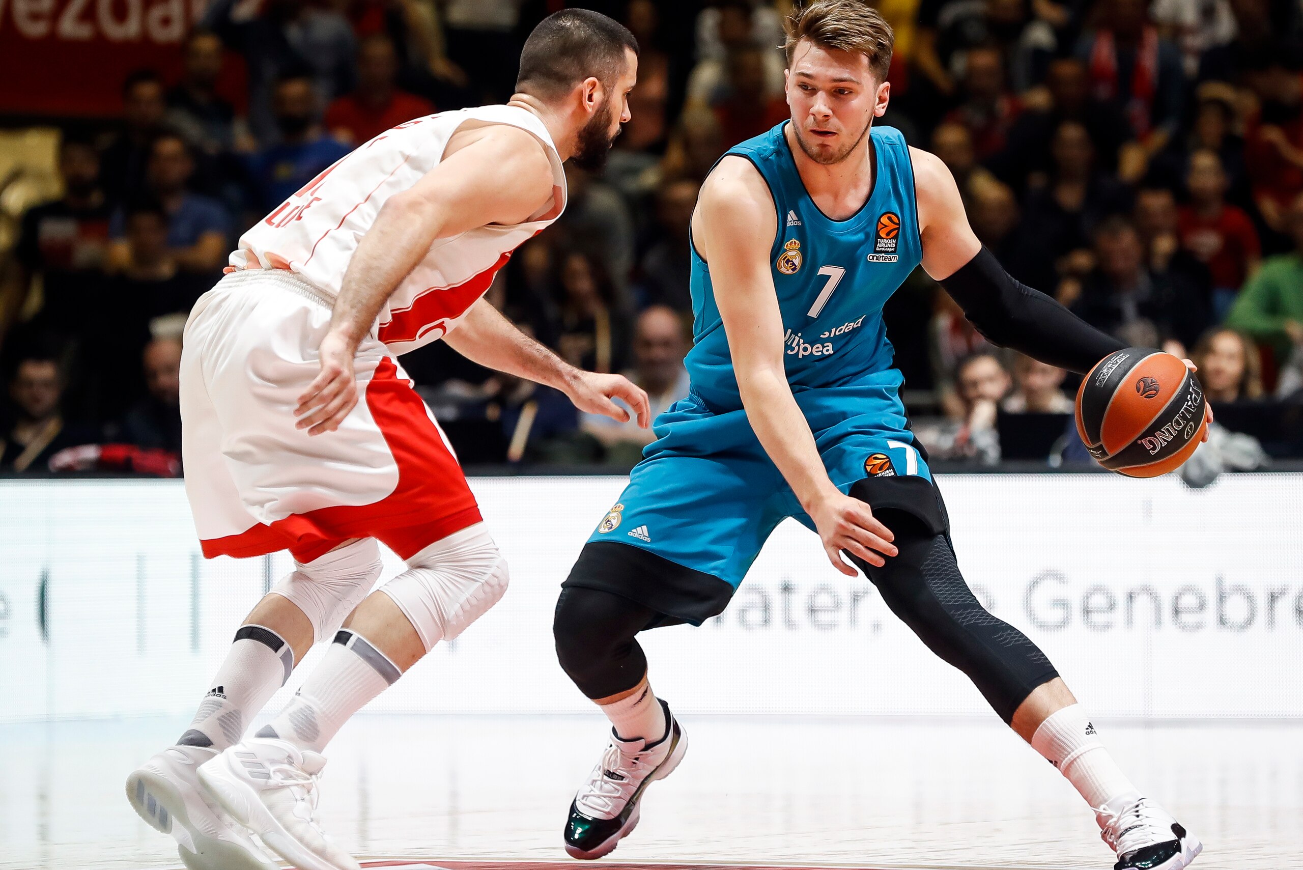 BELGRADE, SERBIA - MARCH 30: Luka Doncic (R) of Real Madrid in action against Branko Lazic (L) of Crvena Zvezda during the 2017/2018 Turkish Airlines EuroLeague Regular Season game between Crvena Zvezda mts Belgrade and Real Madrid at Aleksandar Nikolic H