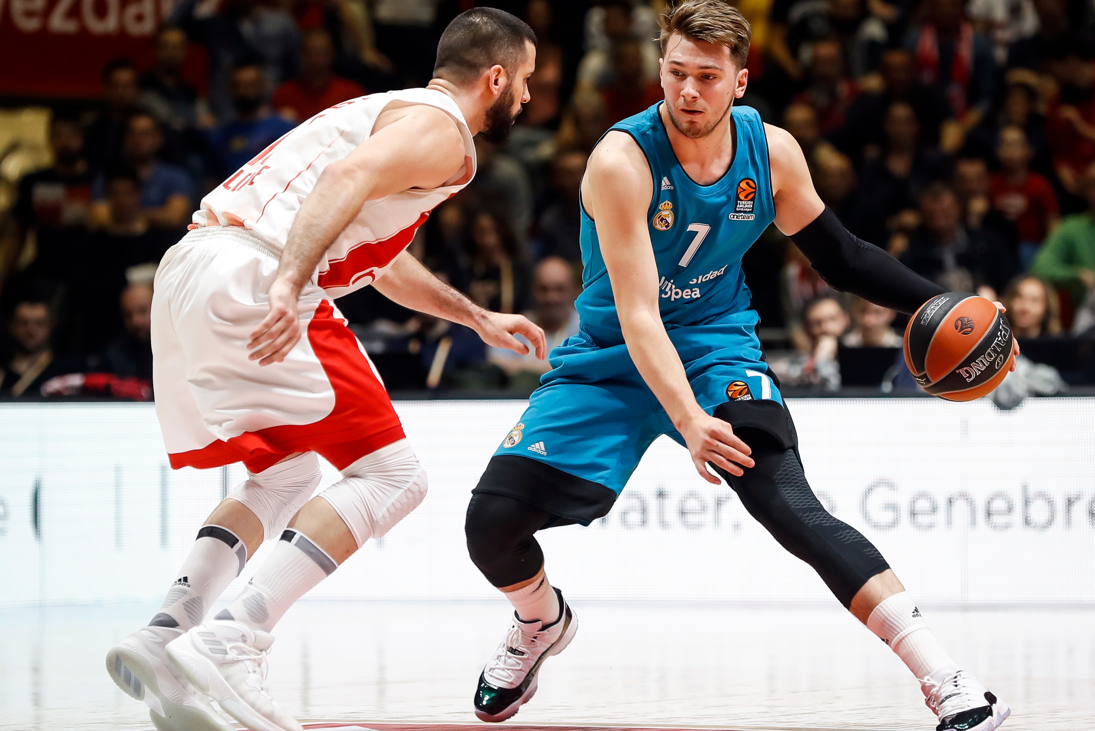 BELGRADE, SERBIA - MARCH 30: Luka Doncic (R) of Real Madrid in action against Branko Lazic (L) of Crvena Zvezda during the 2017/2018 Turkish Airlines EuroLeague Regular Season game between Crvena Zvezda mts Belgrade and Real Madrid at Aleksandar Nikolic H