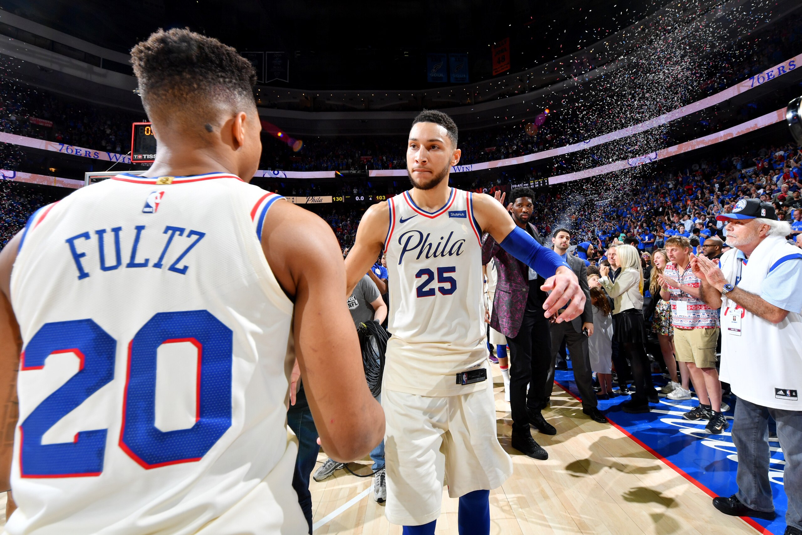 PHILADELPHIA, PA - APRIL 14:  Markelle Fultz #20 and Ben Simmons #25 of the Philadelphia 76ers exchange a hug after game one of round one of the 2018 NBA Playoffs against the Miami Heat on April 14, 2018 at Wells Fargo Center in Philadelphia, Pennsylvania