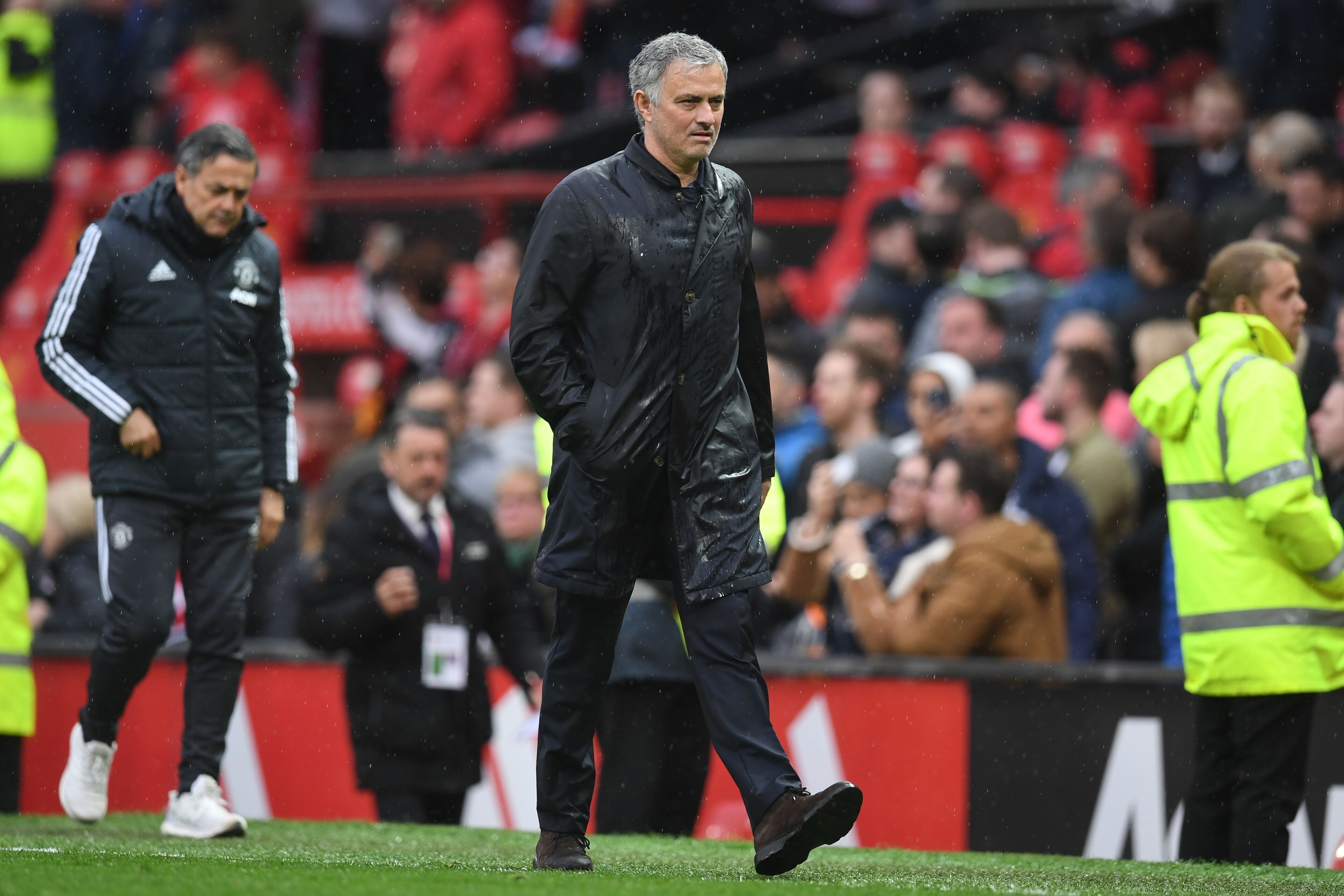 Manchester United's Portuguese manager Jose Mourinho walks off after the English Premier League football match between Manchester United and West Bomwich Albion at Old Trafford in Manchester, north west England, on April 15, 2018.
Manchester City were cro