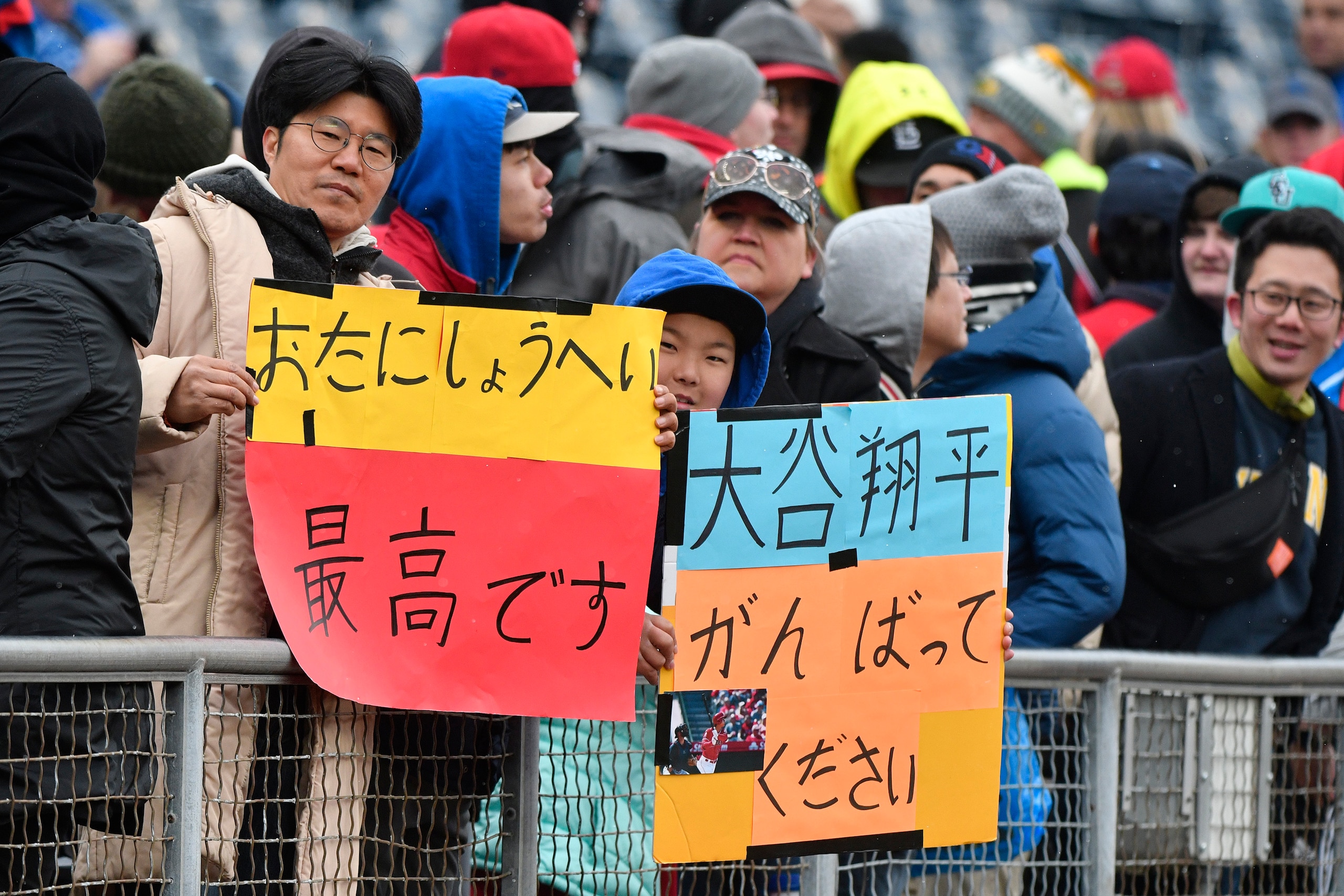 KANSAS CITY, MO - APRIL 15: Fans line up along the stadium rail as they wait for Shohei Ohtani #17 of the Los Angeles Angels of Anaheim to come out onto the field prior to a game against the Kansas City Royals at Kauffman Stadium on April 15, 2018 in Kans