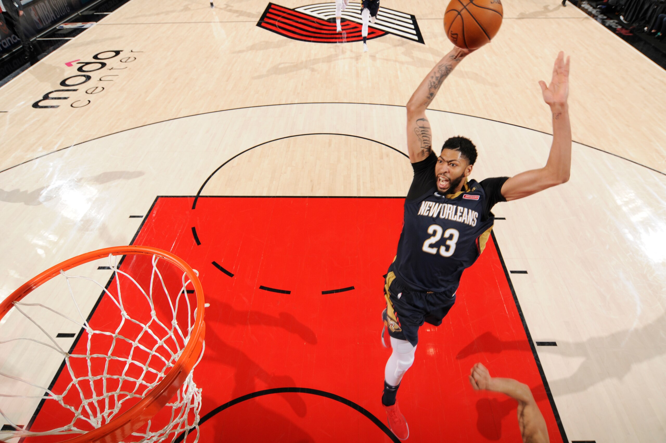 PORTLAND, OR - APRIL 14: Anthony Davis #23 of the New Orleans Pelicans dunks the ball against the Portland Trail Blazers  in game one of round one of the 2018 NBA Playoffs on April 14, 2018 at the Moda Center in Portland, Oregon. NOTE TO USER: User expres