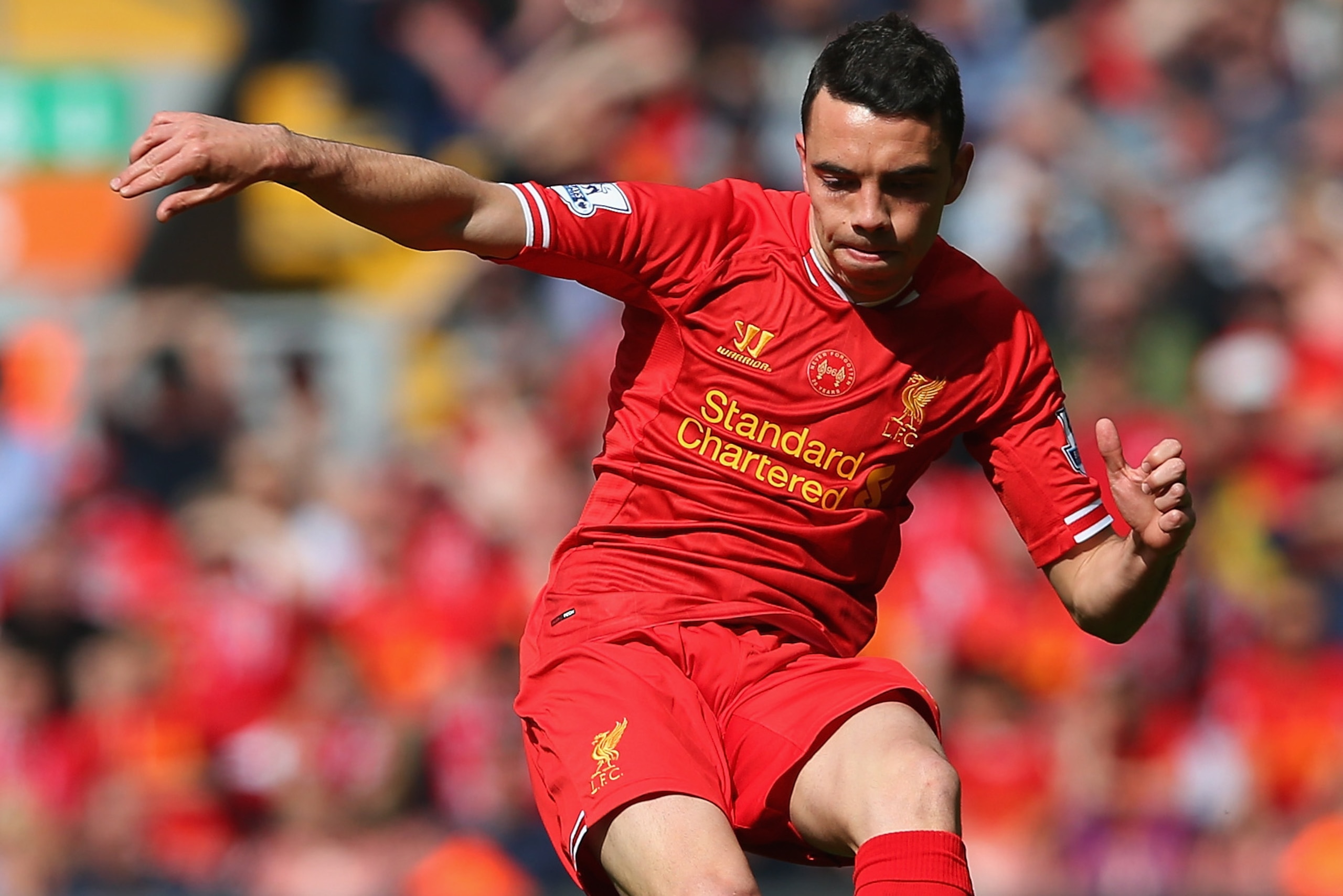 LIVERPOOL, ENGLAND - APRIL 27: Iago Aspas of Liverpool in action during the Barclays Premier League match between Liverpool and Chelsea at Anfield on April 27, 2014 in Liverpool, England.  (Photo by Clive Brunskill/Getty Images)