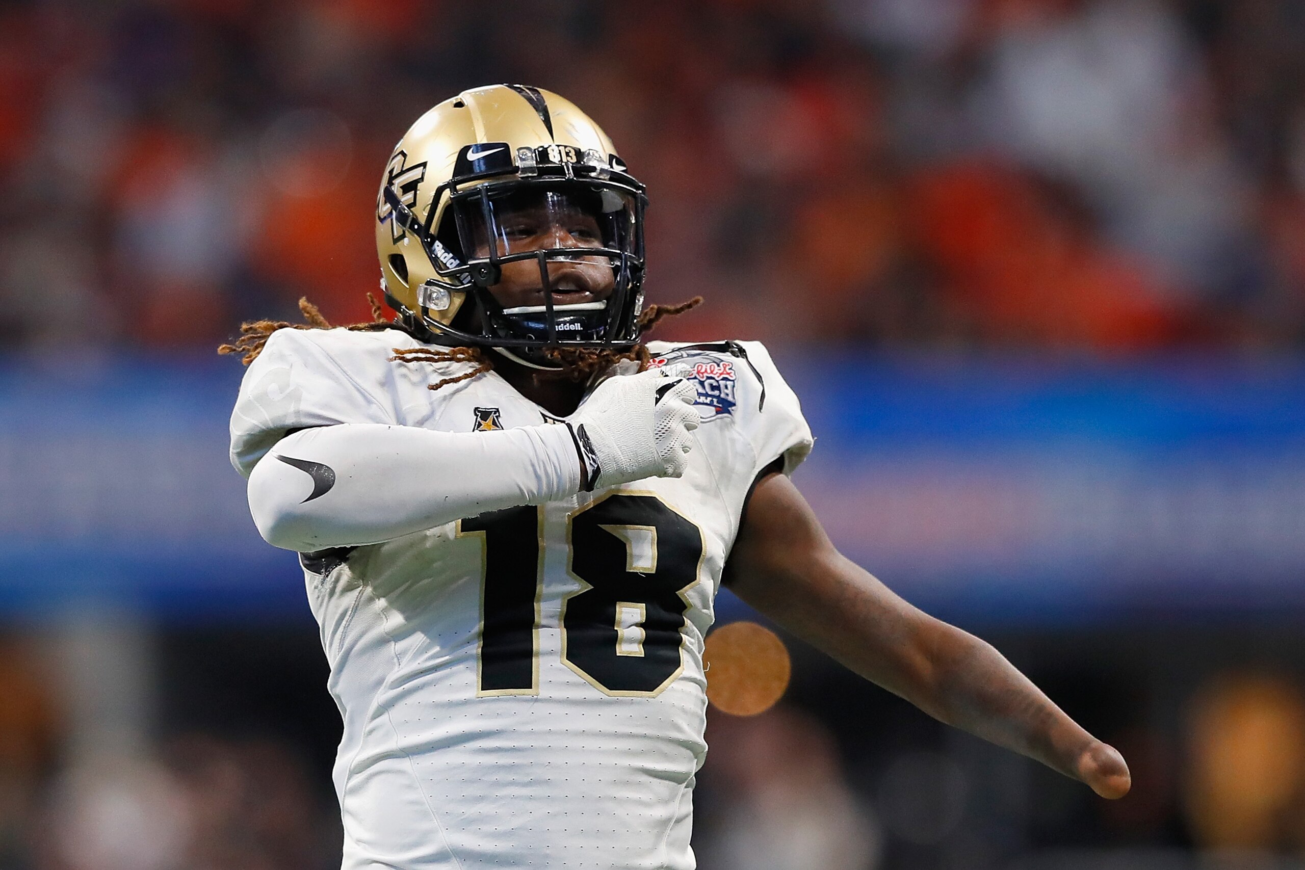 ATLANTA, GA - JANUARY 01:  Shaquem Griffin #18 of the UCF Knights celebrates after sacking Jarrett Stidham #8 of the Auburn Tigers (not pictured) in the second half during the Chick-fil-A Peach Bowl at Mercedes-Benz Stadium on January 1, 2018 in Atlanta, 
