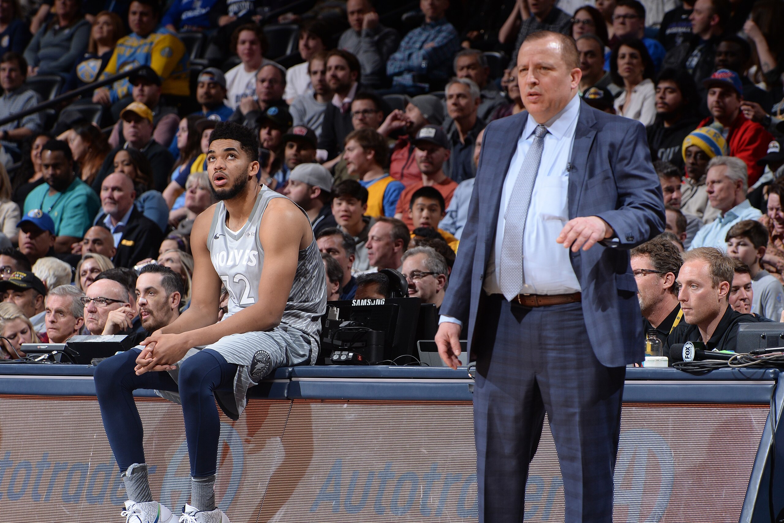 DENVER, CO - APRIL 5:  Tom Thibodeau and Karl-Anthony Towns #32 of the Minnesota Timberwolves look on during the game against the Denver Nuggets on April 5, 2018 at the Pepsi Center in Denver, Colorado. NOTE TO USER: User expressly acknowledges and agrees