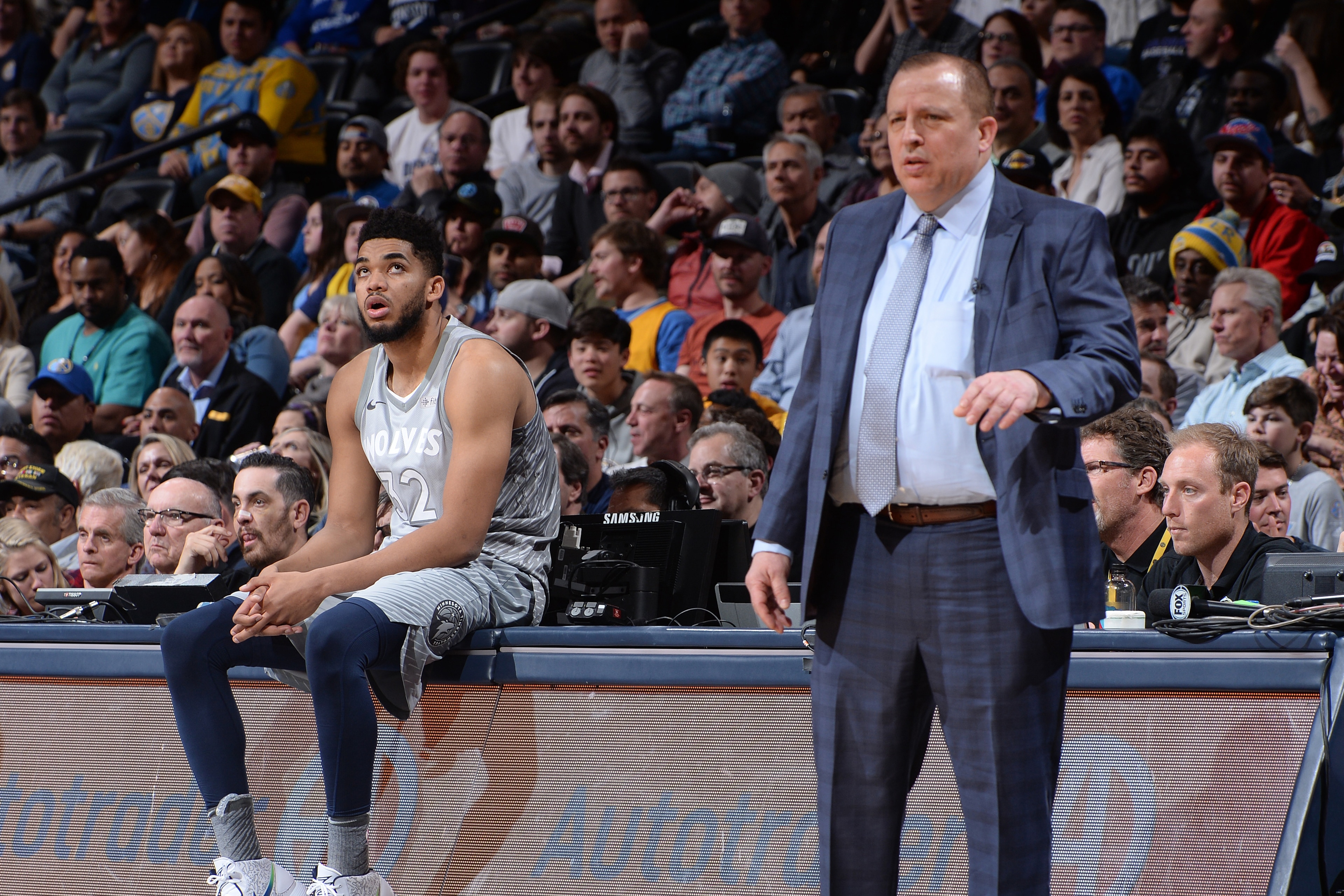 DENVER, CO - APRIL 5:  Tom Thibodeau and Karl-Anthony Towns #32 of the Minnesota Timberwolves look on during the game against the Denver Nuggets on April 5, 2018 at the Pepsi Center in Denver, Colorado. NOTE TO USER: User expressly acknowledges and agrees