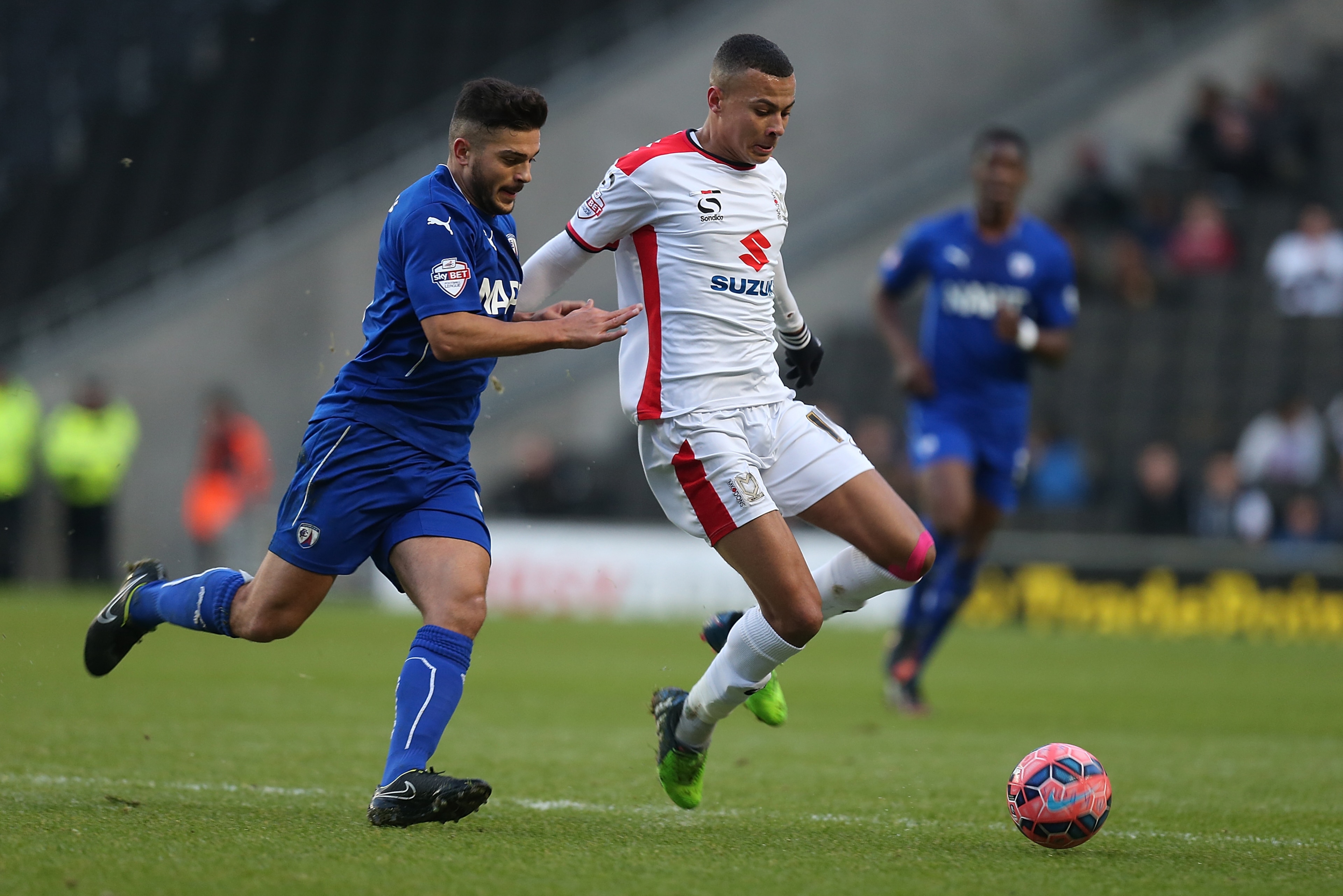 MILTON KEYNES, ENGLAND - DECEMBER 06: Dele Alli of MK Dons looks to the ball with Sam Morsy of Chesterfield during the FA Cup Second Round match between MK Dons and Chesterfield at Stadium mk on December 6, 2014 in Milton Keynes, England. (Photo by Pete MILTON KEYNES, ENGLAND - DECEMBER 06: Dele Alli of MK Dons looks to the ball with Sam Morsy of Chesterfield during the FA Cup Second Round match between MK Dons and Chesterfield at Stadium mk on December 6, 2014 in Milton Keynes, England. (Photo by Pete