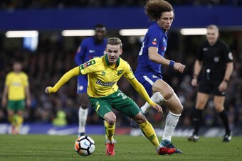 Norwich City's English midfielder James Maddison (L) vies with Chelsea's Brazilian defender David Luiz during the FA Cup third round replay football match between Chelsea and Norwich City at Stamford Bridge in London on January 17, 2018. / AFP PHOTO / Adr