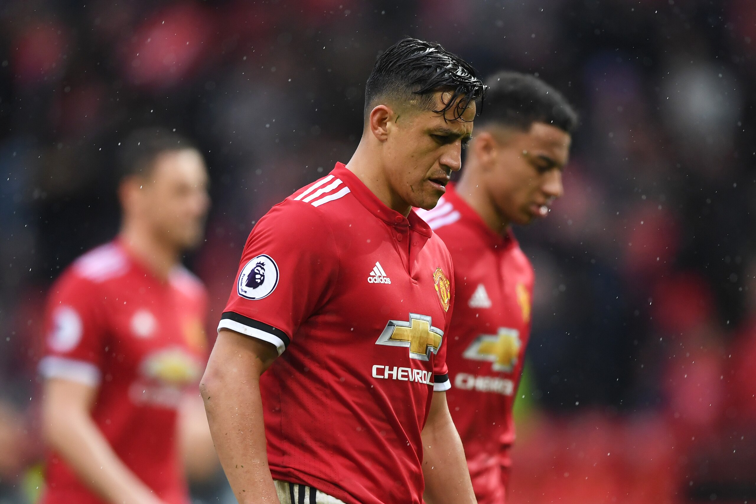MANCHESTER, ENGLAND - APRIL 15:  Alexis Sanchez of Manchester United looks dejected after the Premier League match between Manchester United and West Bromwich Albion at Old Trafford on April 15, 2018 in Manchester, England.  (Photo by Shaun Botterill/Gett
