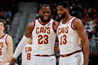 ATLANTA, GA - FEBRUARY 09:  LeBron James #23 of the Cleveland Cavaliers converses with Tristan Thompson #13 during the game against the Atlanta Hawks at Philips Arena on February 9, 2018 in Atlanta, Georgia.  NOTE TO USER: User expressly acknowledges and 