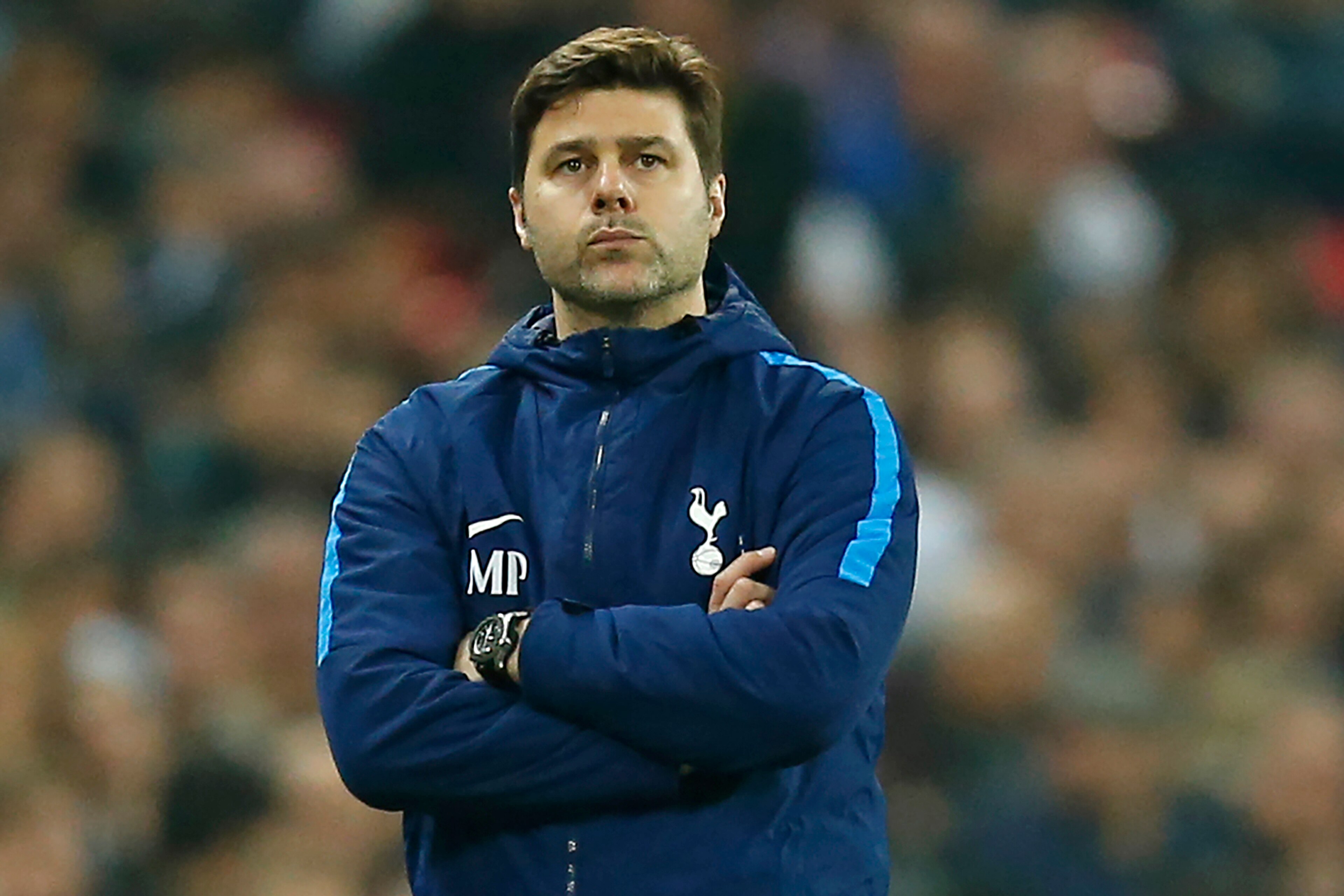 Tottenham Hotspur's Argentinian head coach Mauricio Pochettino watches from the touchline during the English Premier League football match between Tottenham Hotspur and Manchester City at Wembley Stadium in London, on April 14, 2018. / AFP PHOTO / Ian KIN