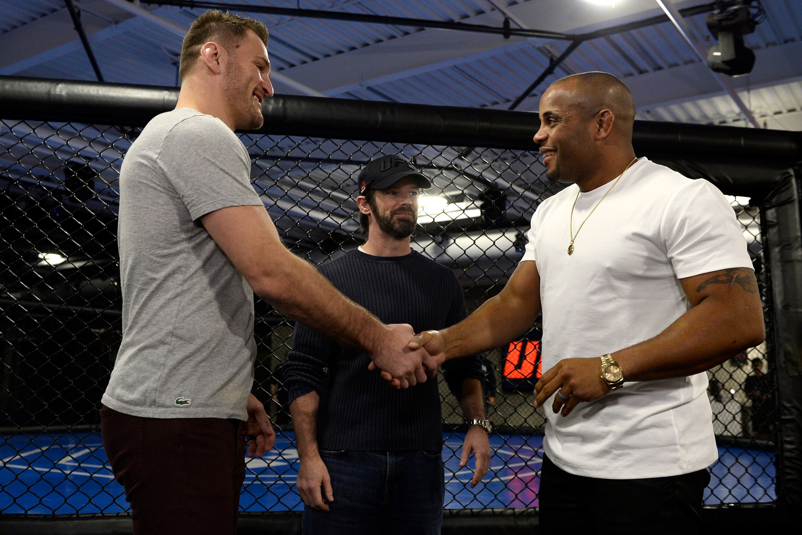 LAS VEGAS, NV - FEBRUARY 02:  (L-R) Stipe Miocic and Daniel Cormier shake hands during the The Ultimate Fighter: Undefeated Cast & Coaches Media Day inside the UFC Performance institute on February 2, 2017 in Las Vegas, Nevada. (Photo by Brandon Magnus/Zu