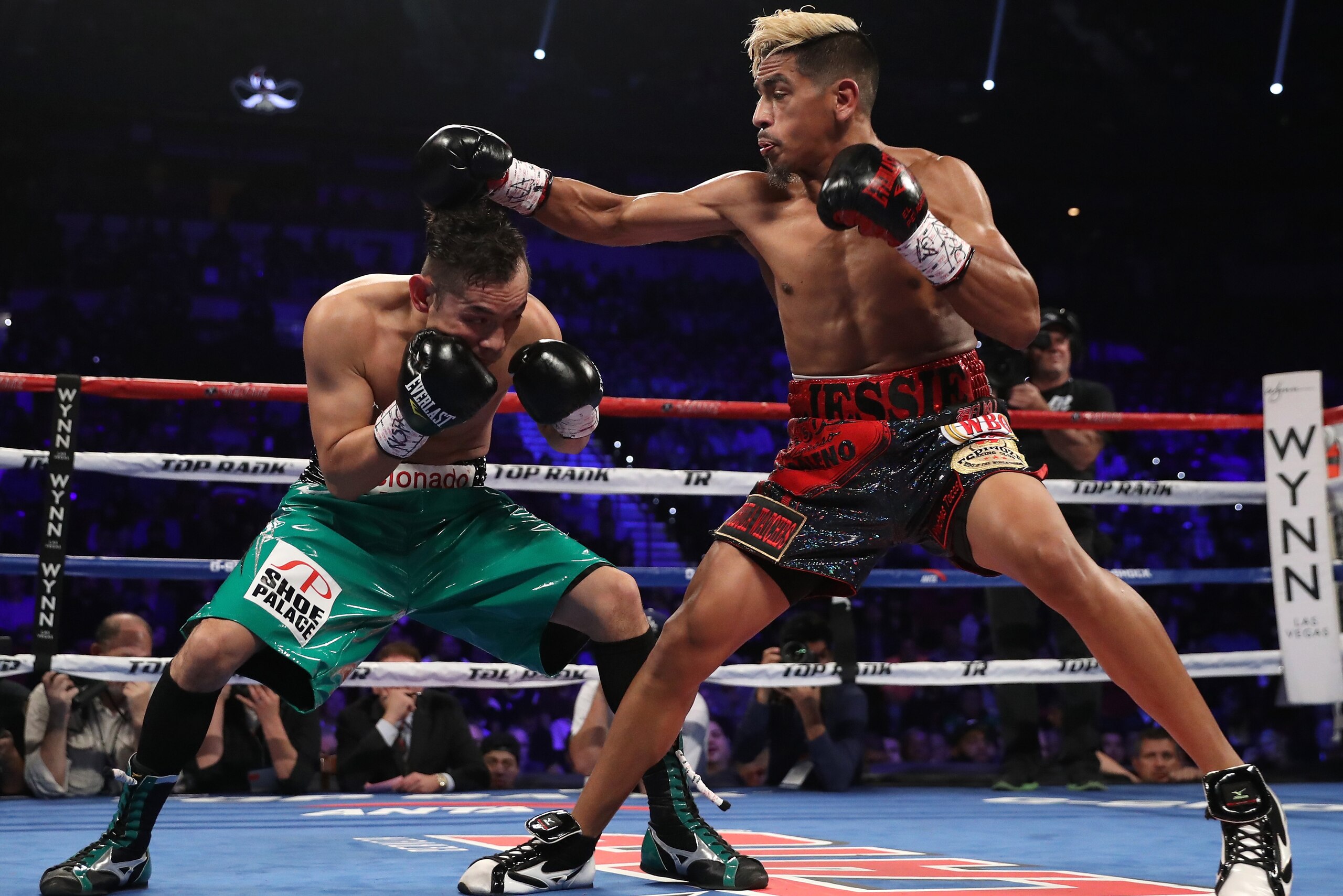 LAS VEGAS, NV - NOVEMBER 05:   Jessie Magdaleno lands a right to the head of opponent Nonito Donaire of the Philippines during their WBO junior featherweight championship fight at the Thomas & Mack Center on November 5, 2016 in Las Vegas, Nevada. (Photo b