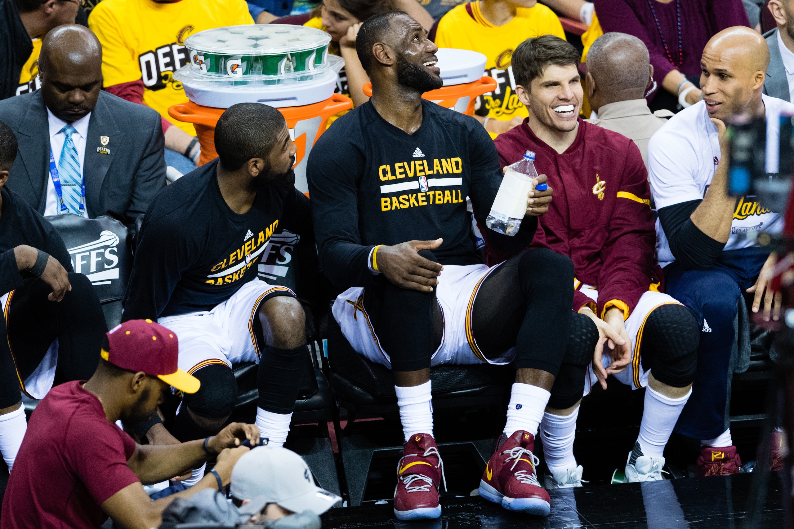 CLEVELAND, OH - MAY 1: Kyrie Irving #2 LeBron James #23 and Kyle Korver #26 of the Cleveland Cavaliers joke on the bench during the second half of Game One of the NBA Eastern Conference semifinals against the Toronto Raptors at Quicken Loans Arena on May 