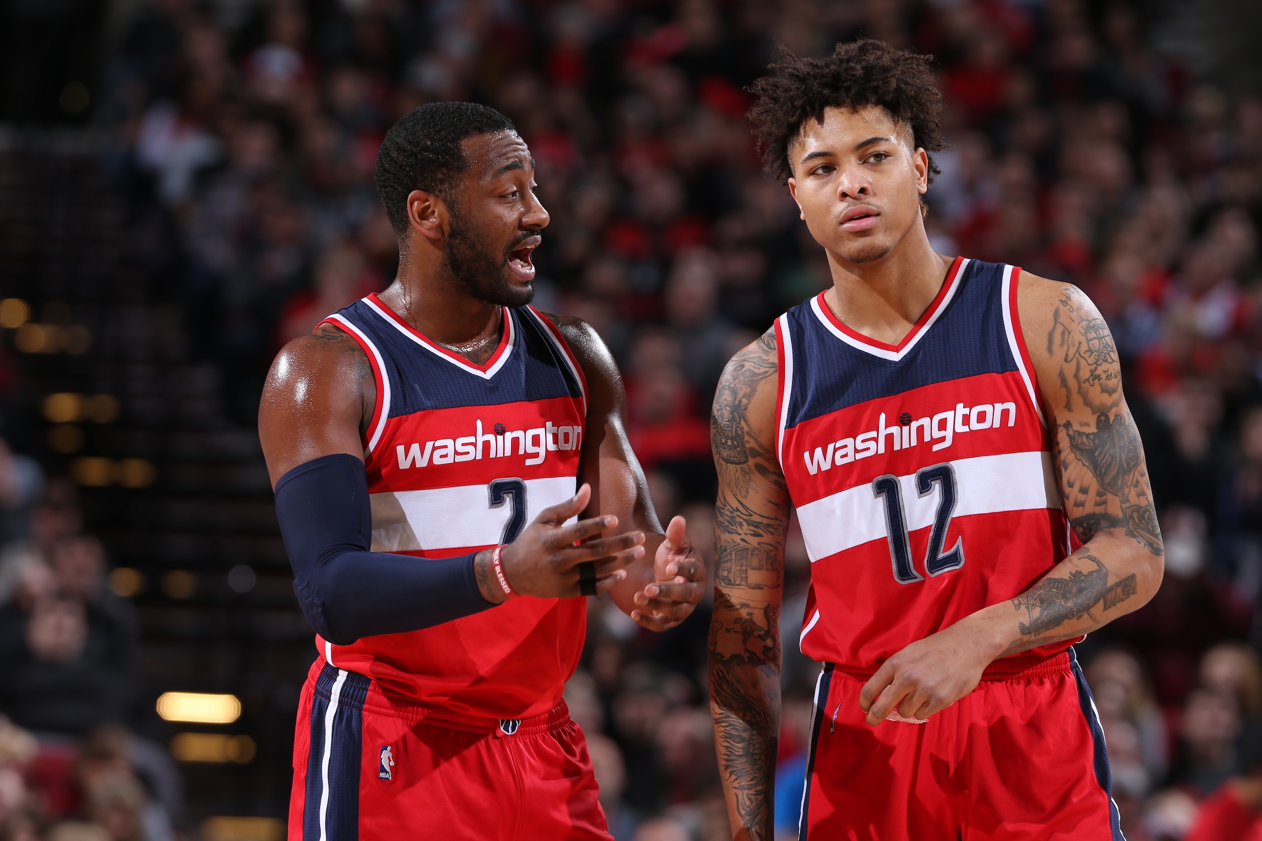 PORTLAND, OR - MARCH 11:  John Wall #2 and Kelly Oubre Jr. #12 of the Washington Wizards during the game against the Portland Trail Blazers on March 11, 2017 at the Moda Center in Portland, Oregon. NOTE TO USER: User expressly acknowledges and agrees that