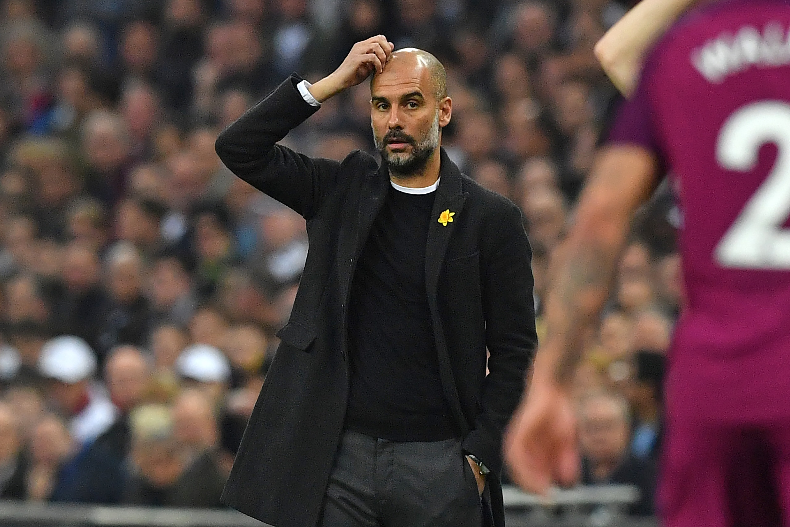 Manchester City's Spanish manager Pep Guardiola gestures on the touchline during the English Premier League football match between Tottenham Hotspur and Manchester City at Wembley Stadium in London, on April 14, 2018. / AFP PHOTO / Ben STANSALL / RESTRICT Manchester City's Spanish manager Pep Guardiola gestures on the touchline during the English Premier League football match between Tottenham Hotspur and Manchester City at Wembley Stadium in London, on April 14, 2018. / AFP PHOTO / Ben STANSALL / RESTRICT