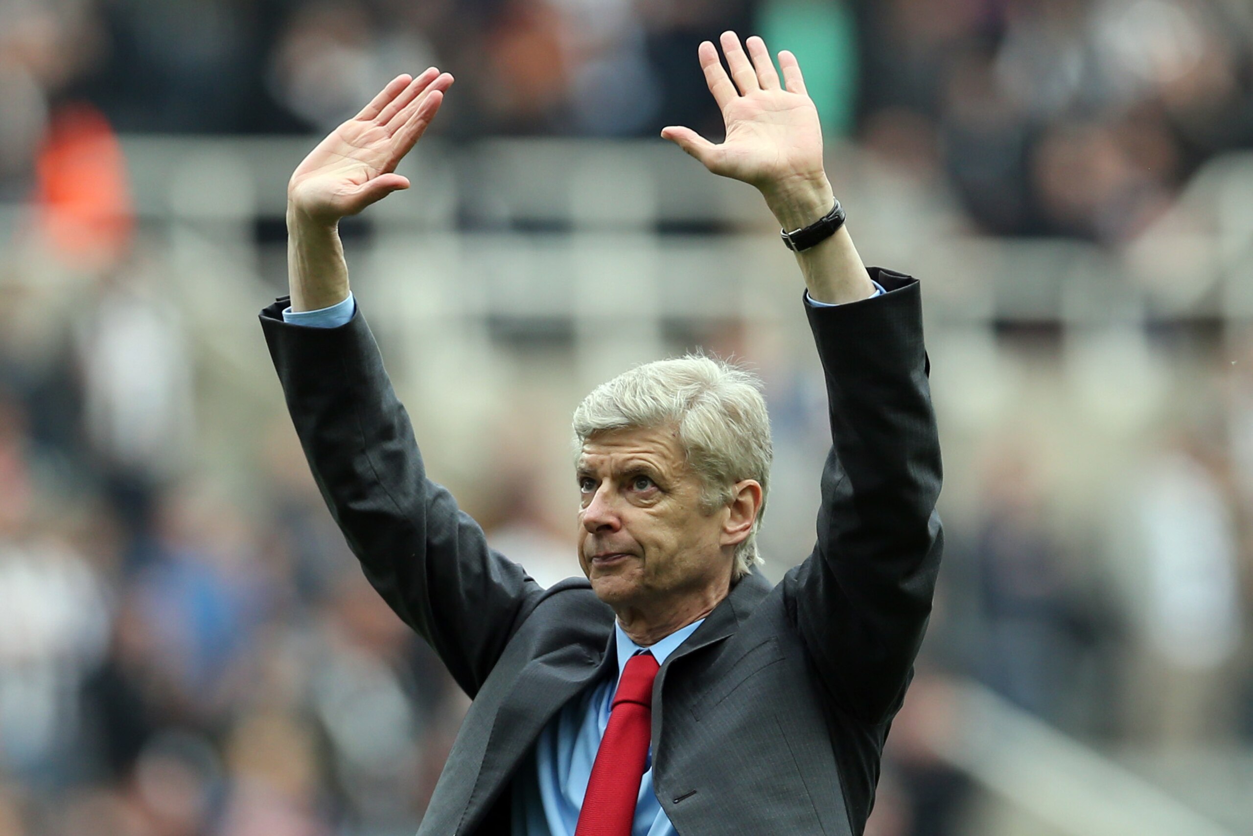 Arsenal's French manager Arsene Wenger gestures to the fans during the English Premier League football match between Newcastle United and Arsenal at St James' Park in Newcastle Upon Tyne, northeast England, on May 19, 2013.  AFP PHOTO / IAN MACNICOL

REST
