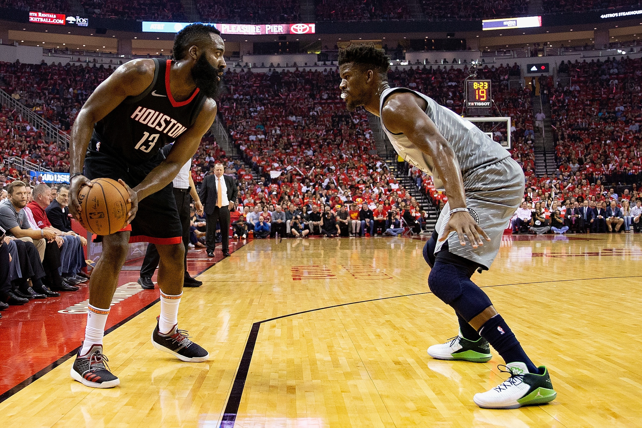 HOUSTON, TX - APRIL 18: James Harden #13 of the Houston Rockets looks for room to shoot on Jimmy Butler #23 of the Minnesota Timberwolves during Game Two of the first round of the Western Conference playoffs at Toyota Center on April 18, 2018 in Houston, 