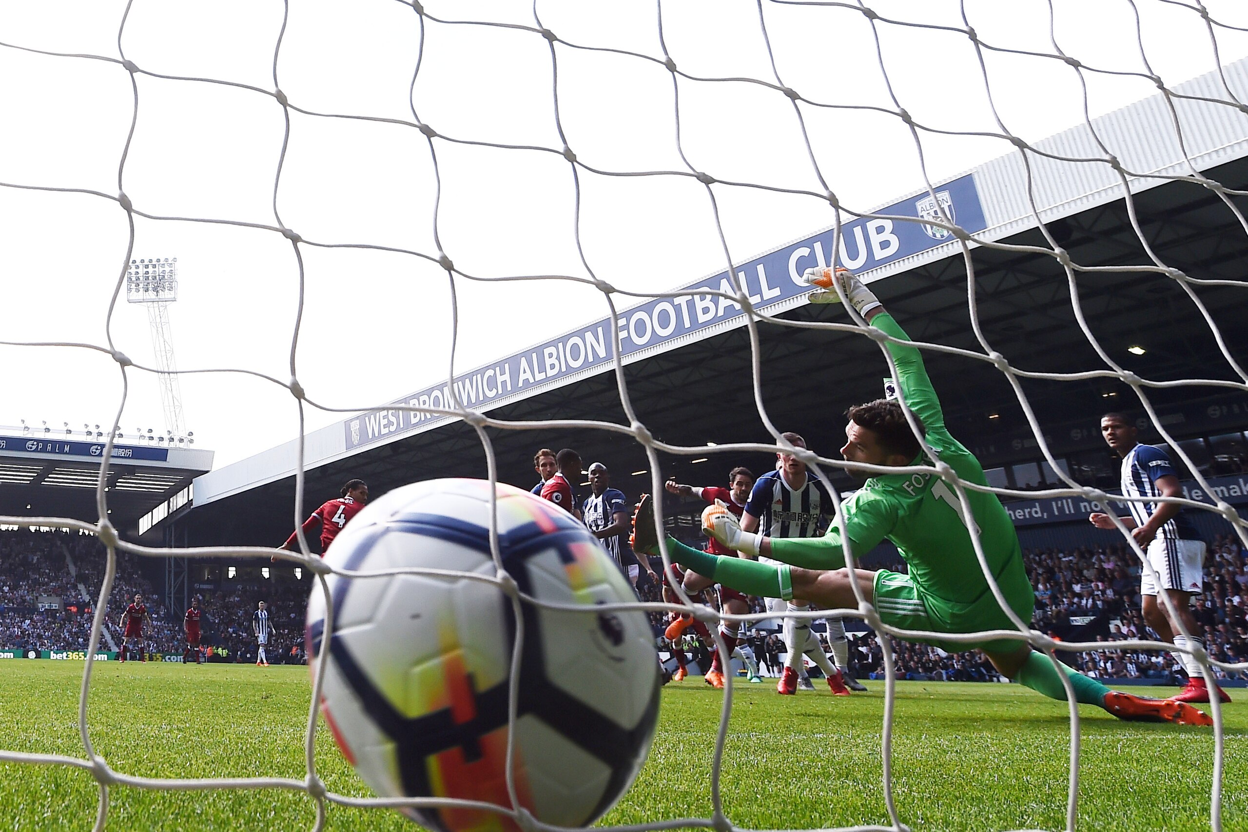 WEST BROMWICH, ENGLAND - APRIL 21:  Danny Ings of Liverpool scores his sides first goal past Ben Foster of West Bromwich Albion during the Premier League match between West Bromwich Albion and Liverpool at The Hawthorns on April 21, 2018 in West Bromwich,