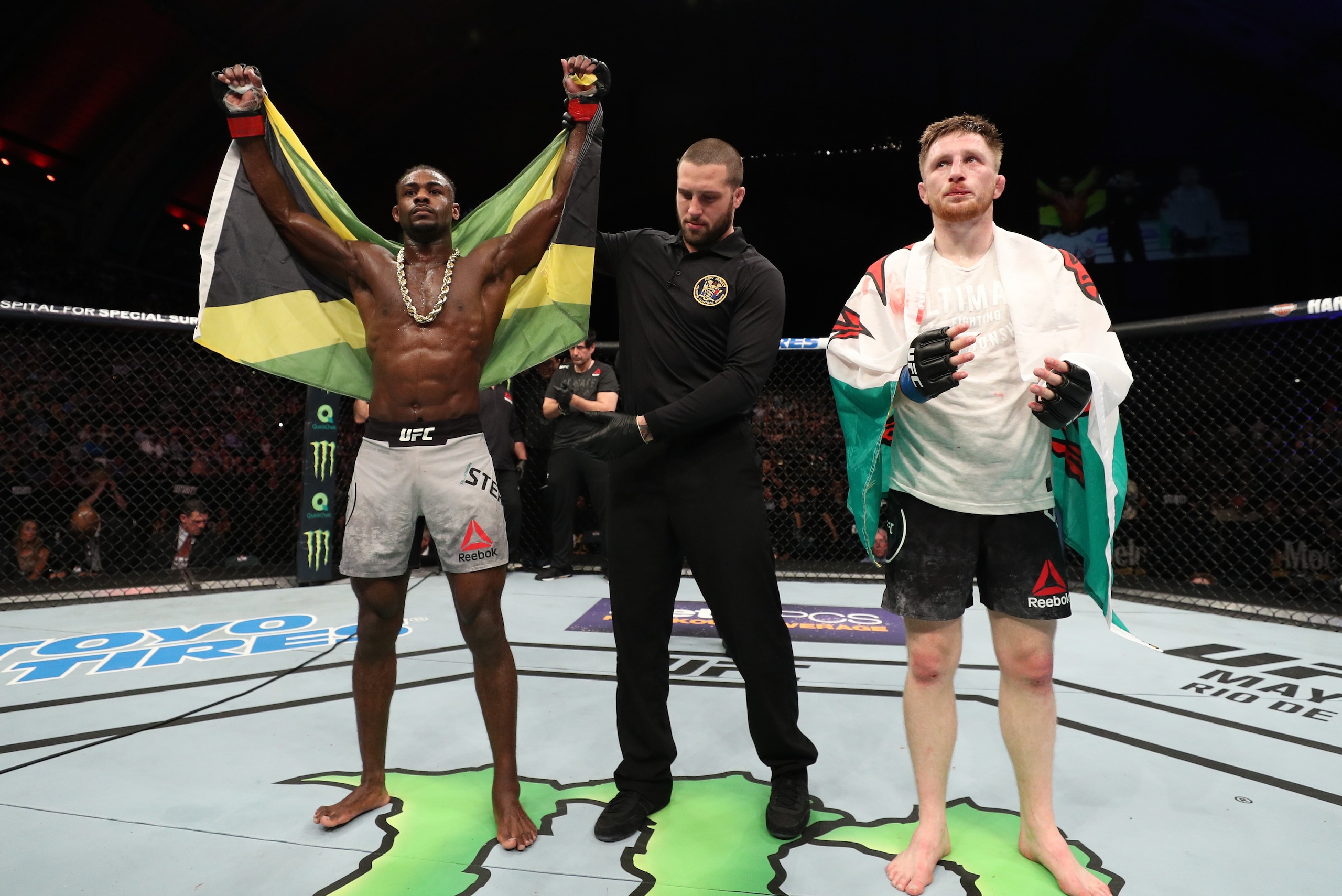 ATLANTIC CITY, NJ - APRIL 21:  Aljamain Sterling celebrates after his unanimous-decision victory over Brett Johns of Wales in their bantamweight fight during the UFC Fight Night event at the Boardwalk Hall on April 21, 2018 in Atlantic City, New Jersey. (