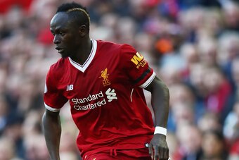 LIVERPOOL, ENGLAND - APRIL 14:  Sadio Mane of Liverpool in action during the Premier League match between Liverpool and AFC Bournemouth at Anfield on April 14, 2018 in Liverpool, England.  (Photo by Clive Brunskill/Getty Images)