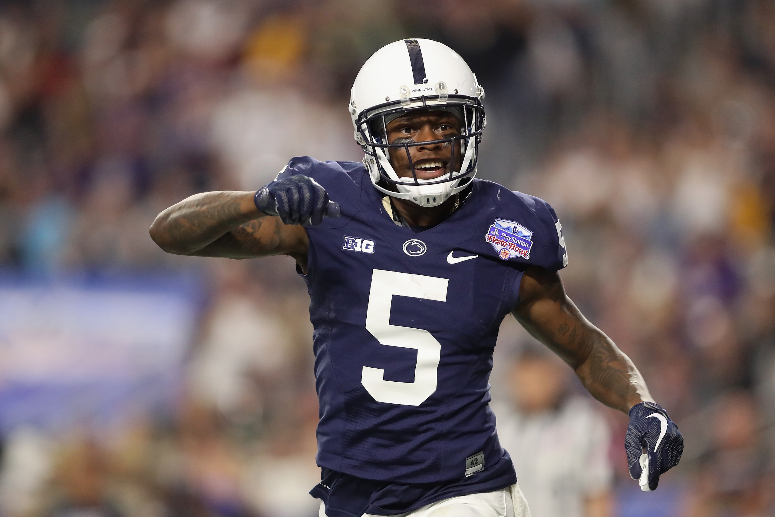 GLENDALE, AZ - DECEMBER 30:  Wide receiver DaeSean Hamilton #5 of the Penn State Nittany Lions celebrates after catching a 24 yard touchdown reception against the Washington Huskies during the second half of the Playstation Fiesta Bowl at University of Ph