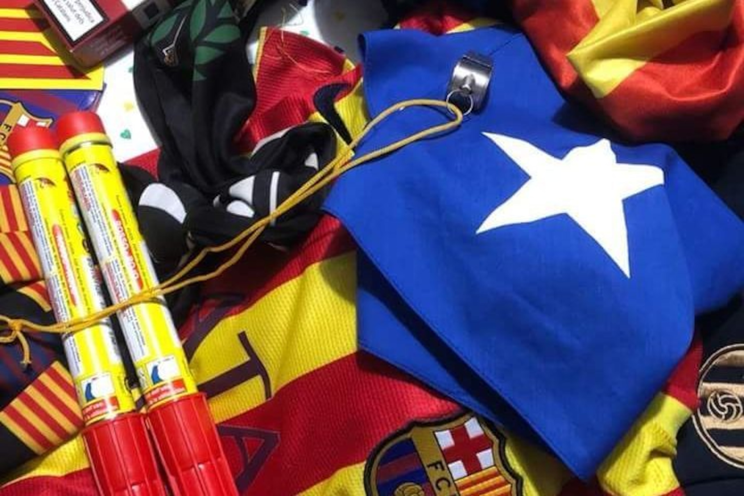 One fan's pack for the match, including a whistle to blow during the Spanish national anthem