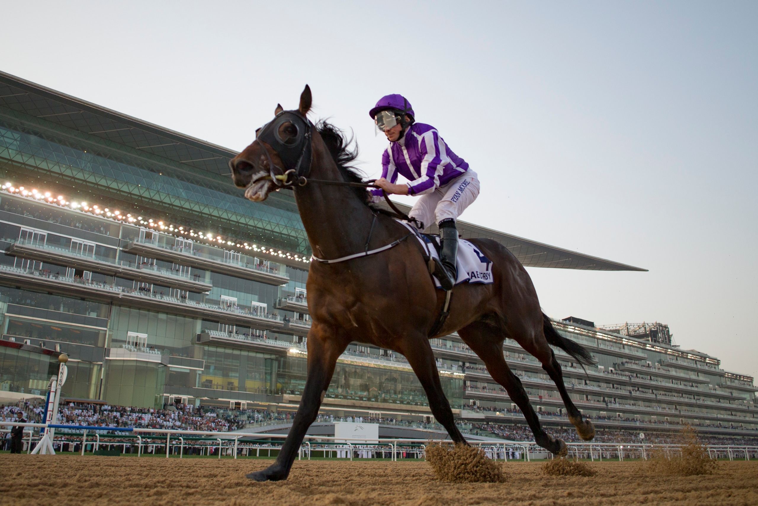 DUBAI, UNITED ARAB EMIRATES - MARCH 31: Mendelssohn #4, ridden by Ryan Moore,  wins the UAE Derby at Meydan Racecourse on March 31, 2018 in Dubai,United Arab Emirates (Photo by Kaz Ishida/Eclipse Sportswire/Getty Images)