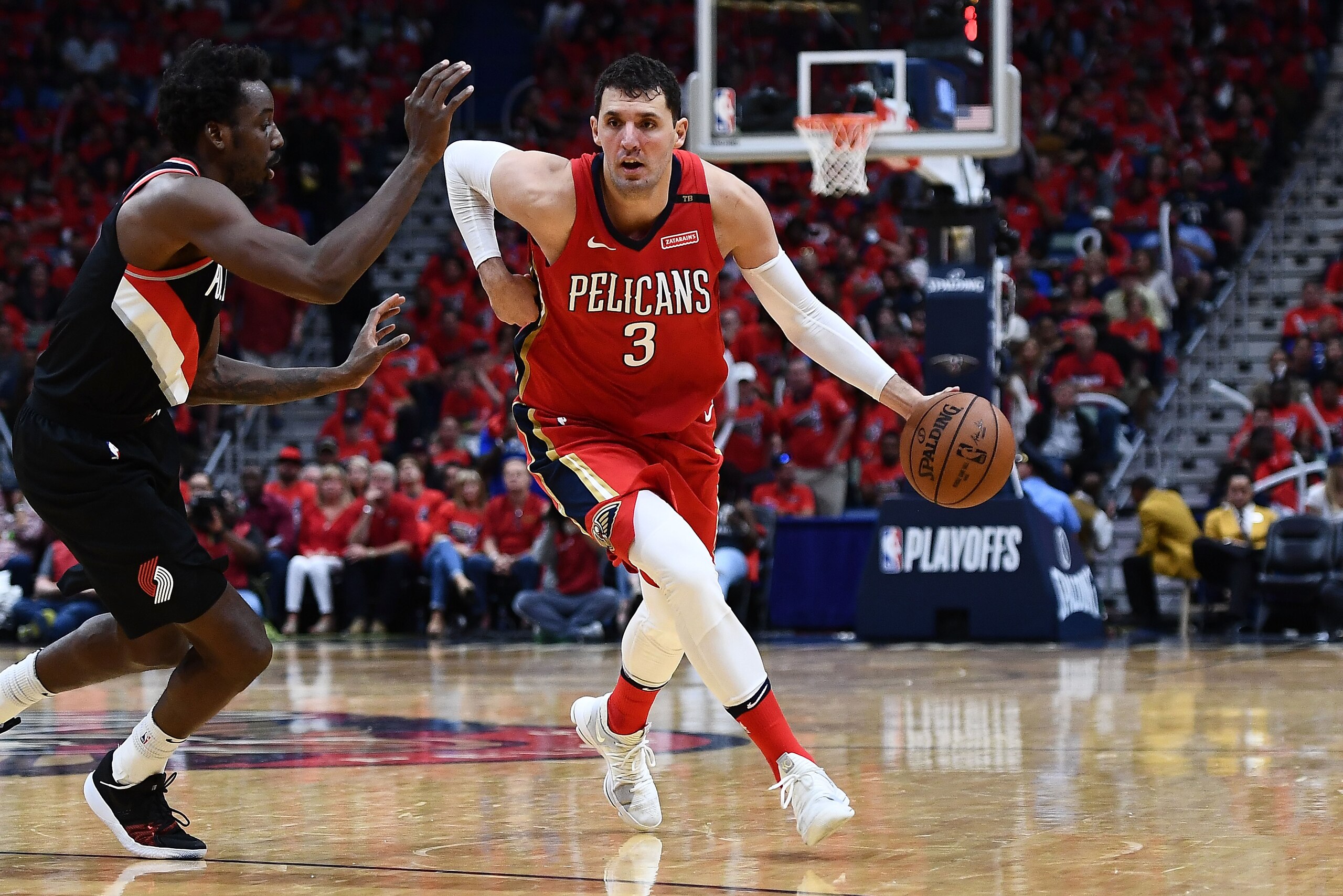 NEW ORLEANS, LA - APRIL 21: Nikola Mirotic #3 of the New Orleans Pelicans drives to the basket against Al-Farouq Aminu #8 of the Portland Trail Blazers during Game Four of the first round of the Western Conference playoffs at the Smoothie King Center on NEW ORLEANS, LA - APRIL 21: Nikola Mirotic #3 of the New Orleans Pelicans drives to the basket against Al-Farouq Aminu #8 of the Portland Trail Blazers during Game Four of the first round of the Western Conference playoffs at the Smoothie King Center on