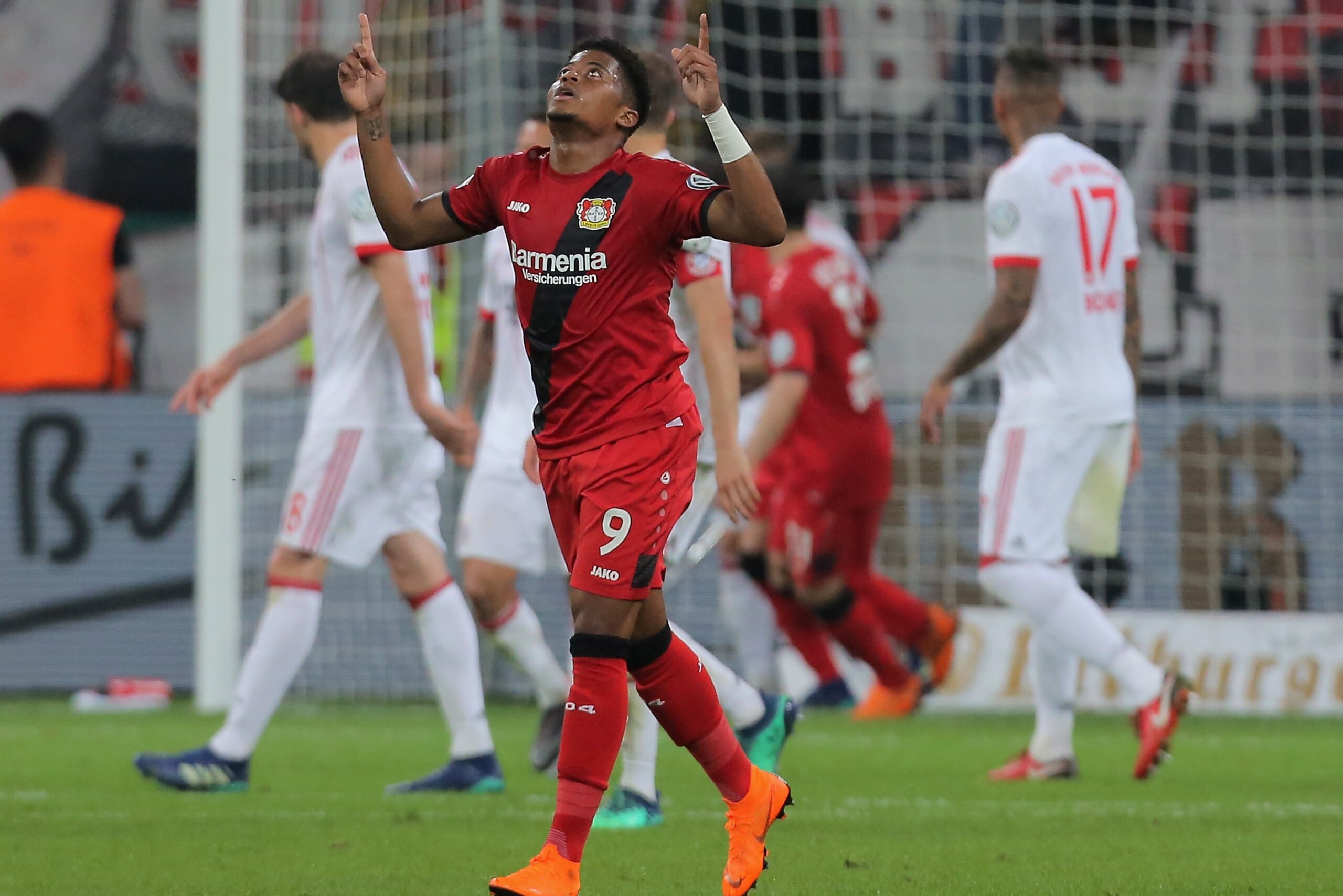 LEVERKUSEN, GERMANY - APRIL 17: Leon Bailey of Leverkusen celebrates after scoring his team's second goal during the DFB Cup semi final match between Bayer 04 Leverkusen and Bayern Munchen at BayArena on April 17, 2018 in Leverkusen, Germany. (Photo by TF