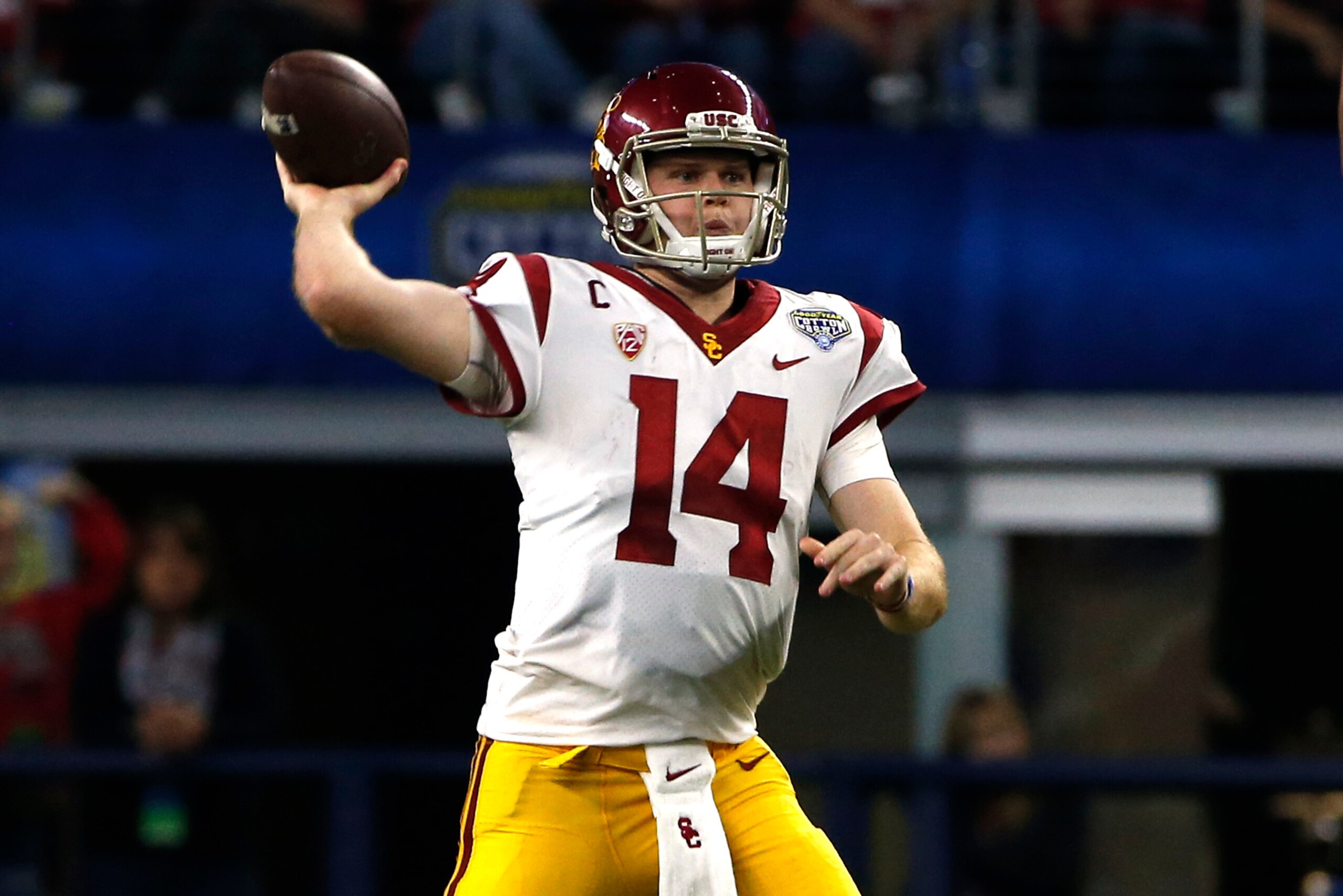 ARLINGTON, TX - DECEMBER 29: Sam Darnold #14 of the USC Trojans throws against the Ohio State Buckeyes in the first half of the 82nd Goodyear Cotton Bowl Classic between USC and Ohio State at AT&T Stadium on December 29, 2017 in Arlington, Texas. (Photo b