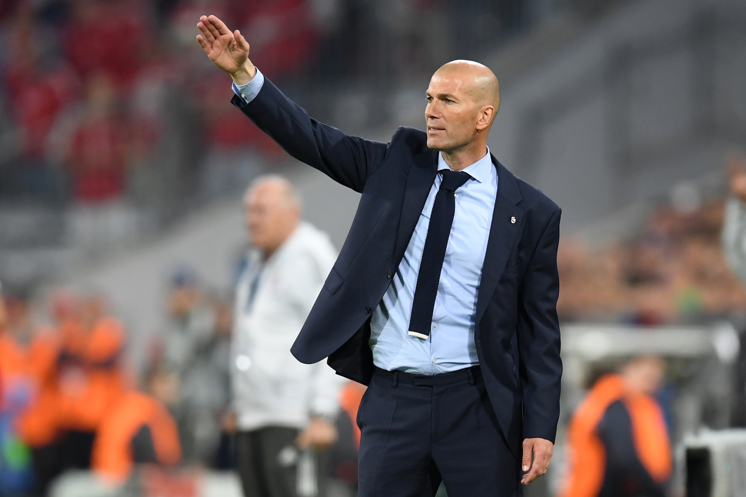 Real Madrid's French coach Zinedine Zidane reacts during the UEFA Champions League semi-final first-leg football match FC Bayern Munich v Real Madrid CF in Munich in southern Germany on April 25, 2018. (Photo by Christof STACHE / AFP)        (Photo credit